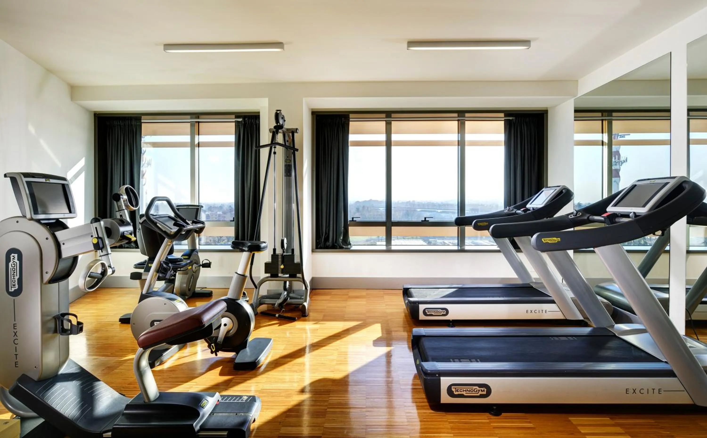 Fitness centre/facilities in UNA Hotels San Vitale Bologna