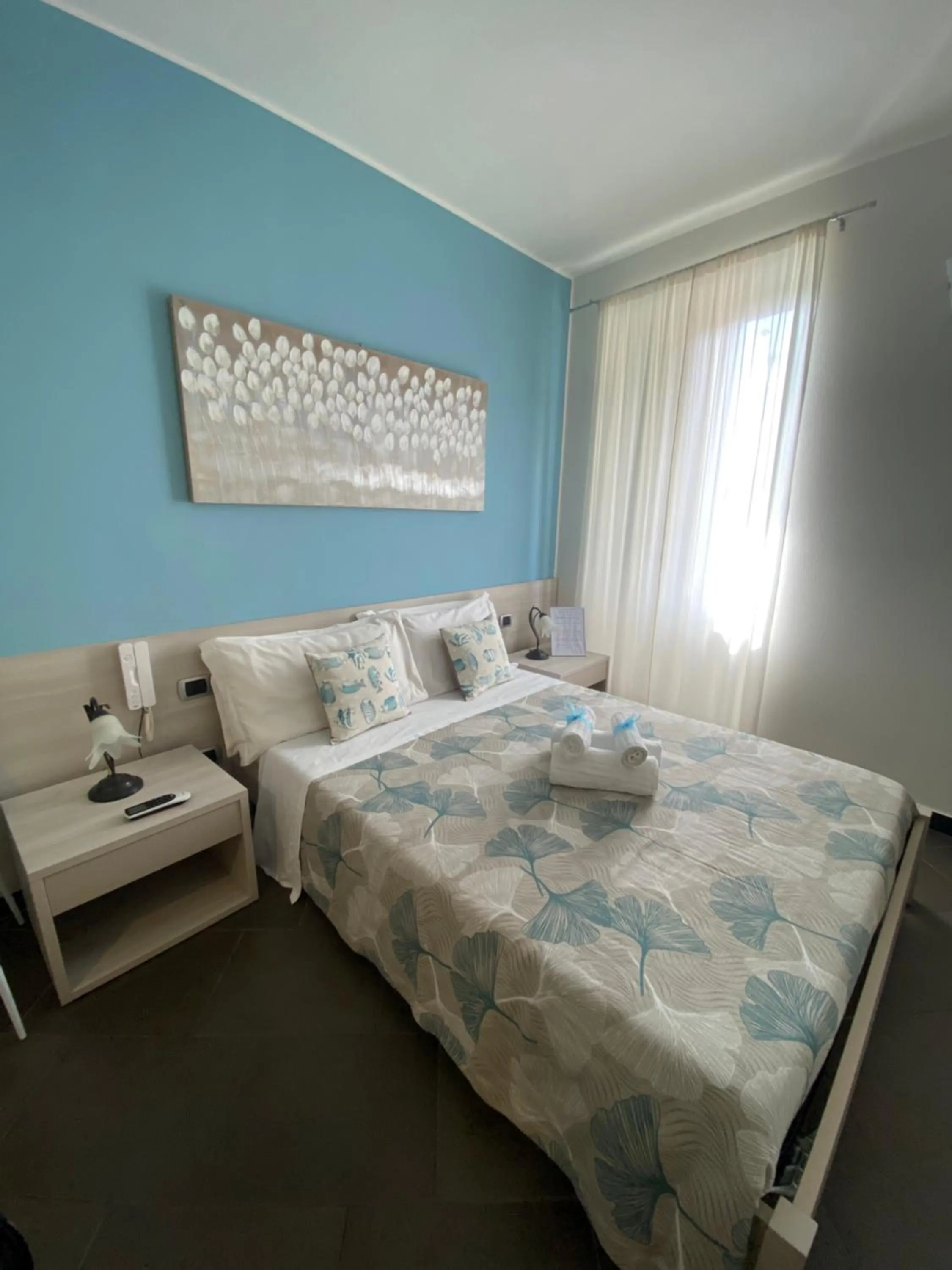 Photo of the whole room, Bed in Pensione Sorriso