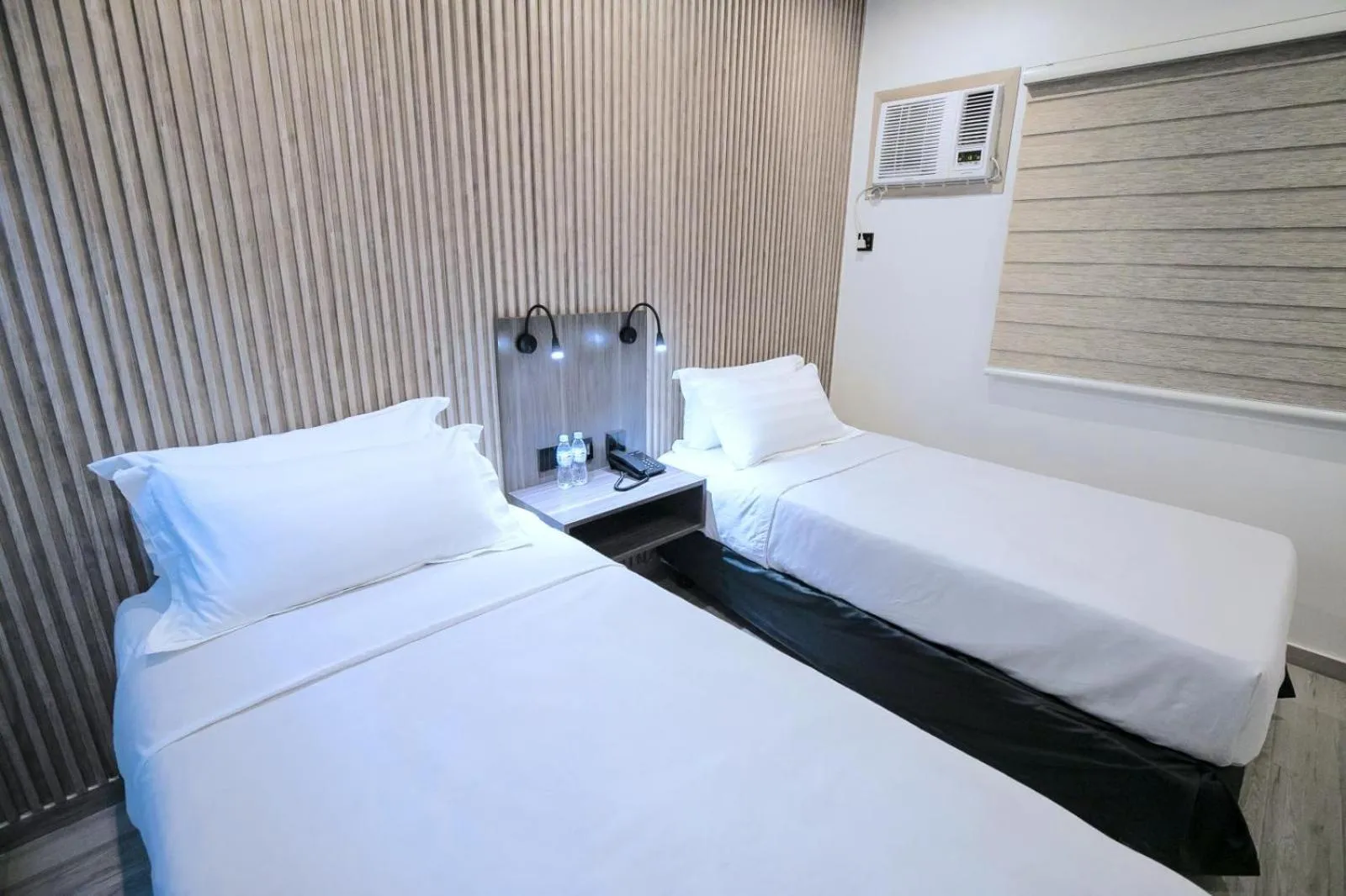Bed in City Pod Hotel
