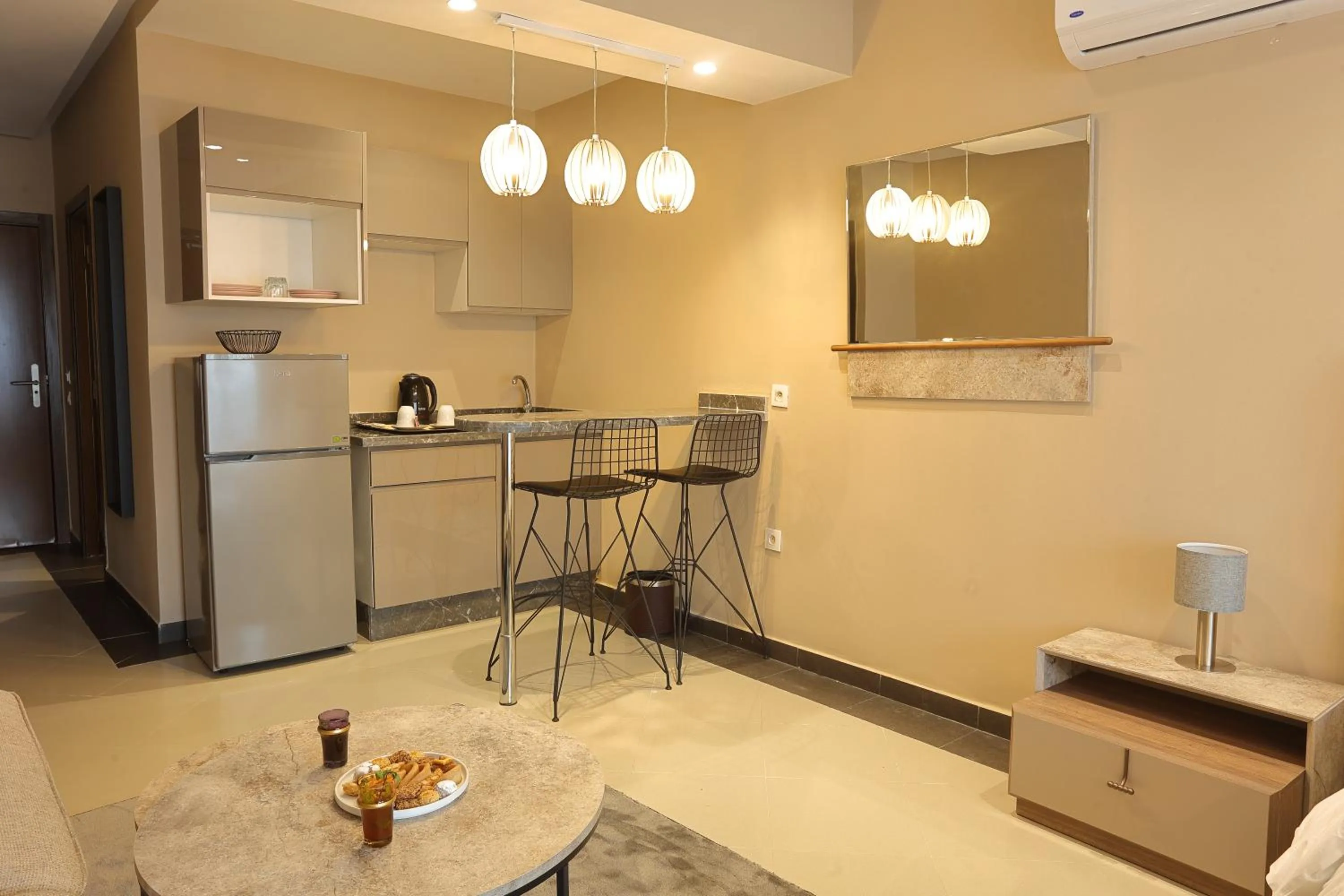 Kitchen or kitchenette in PLAYA DEL PACHA Suites Hotel