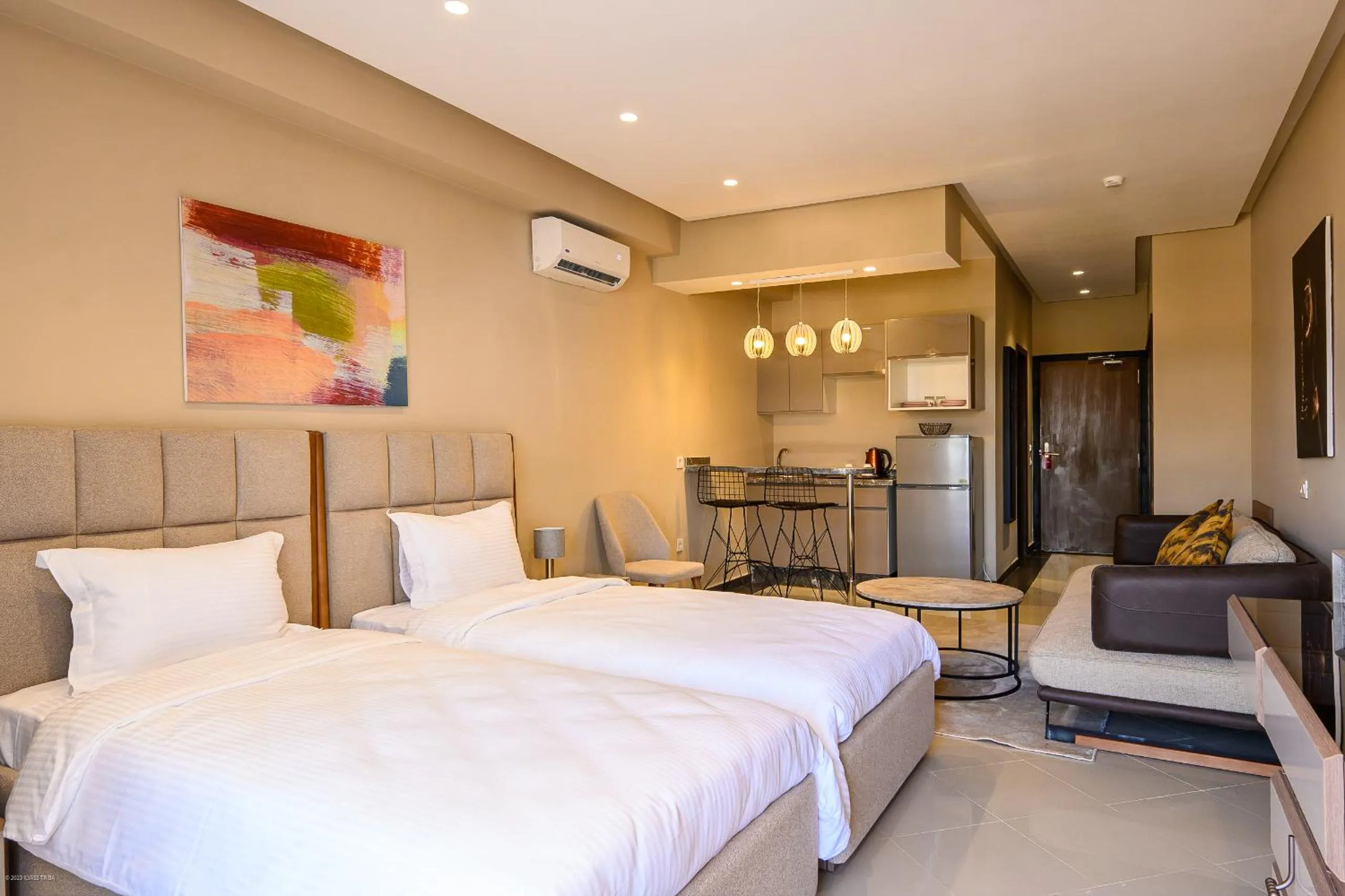 Bed in PLAYA DEL PACHA Suites Hotel