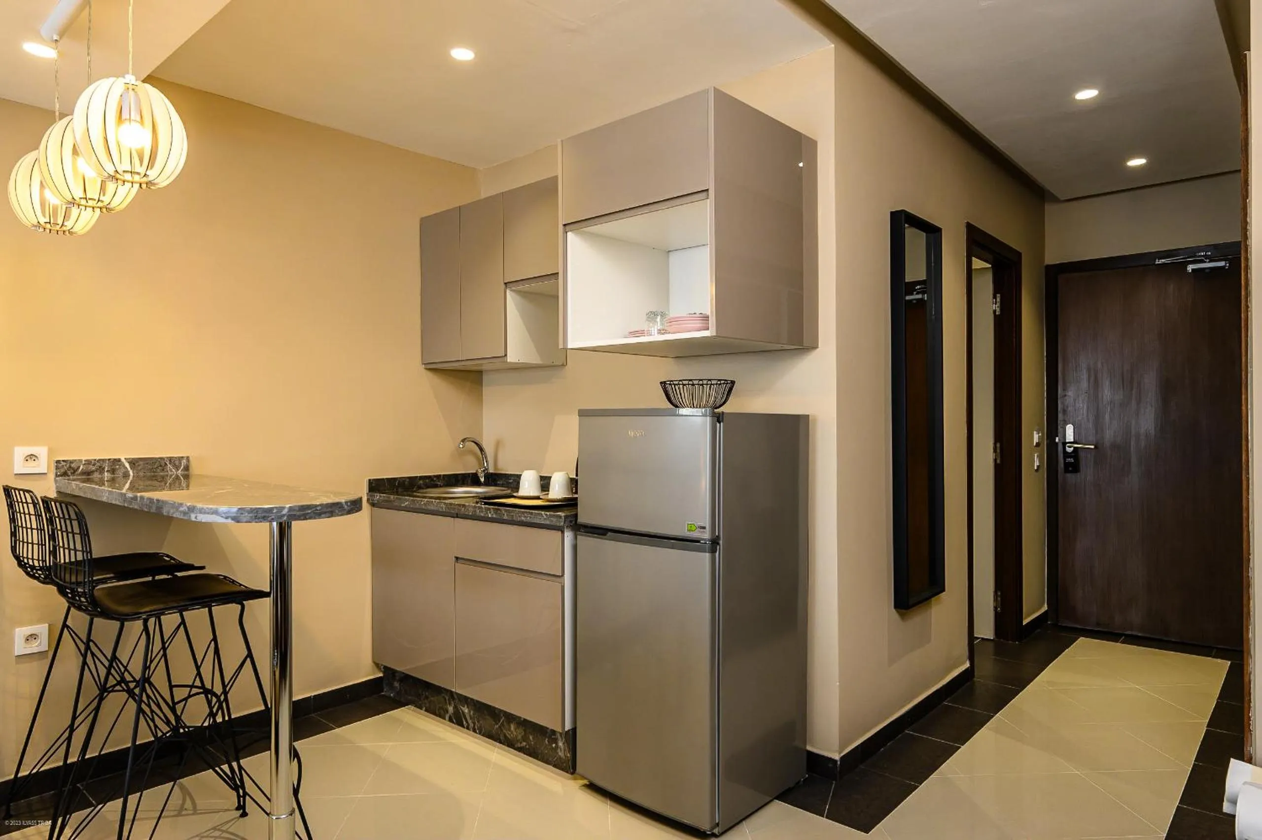 Kitchen or kitchenette in PLAYA DEL PACHA Suites Hotel