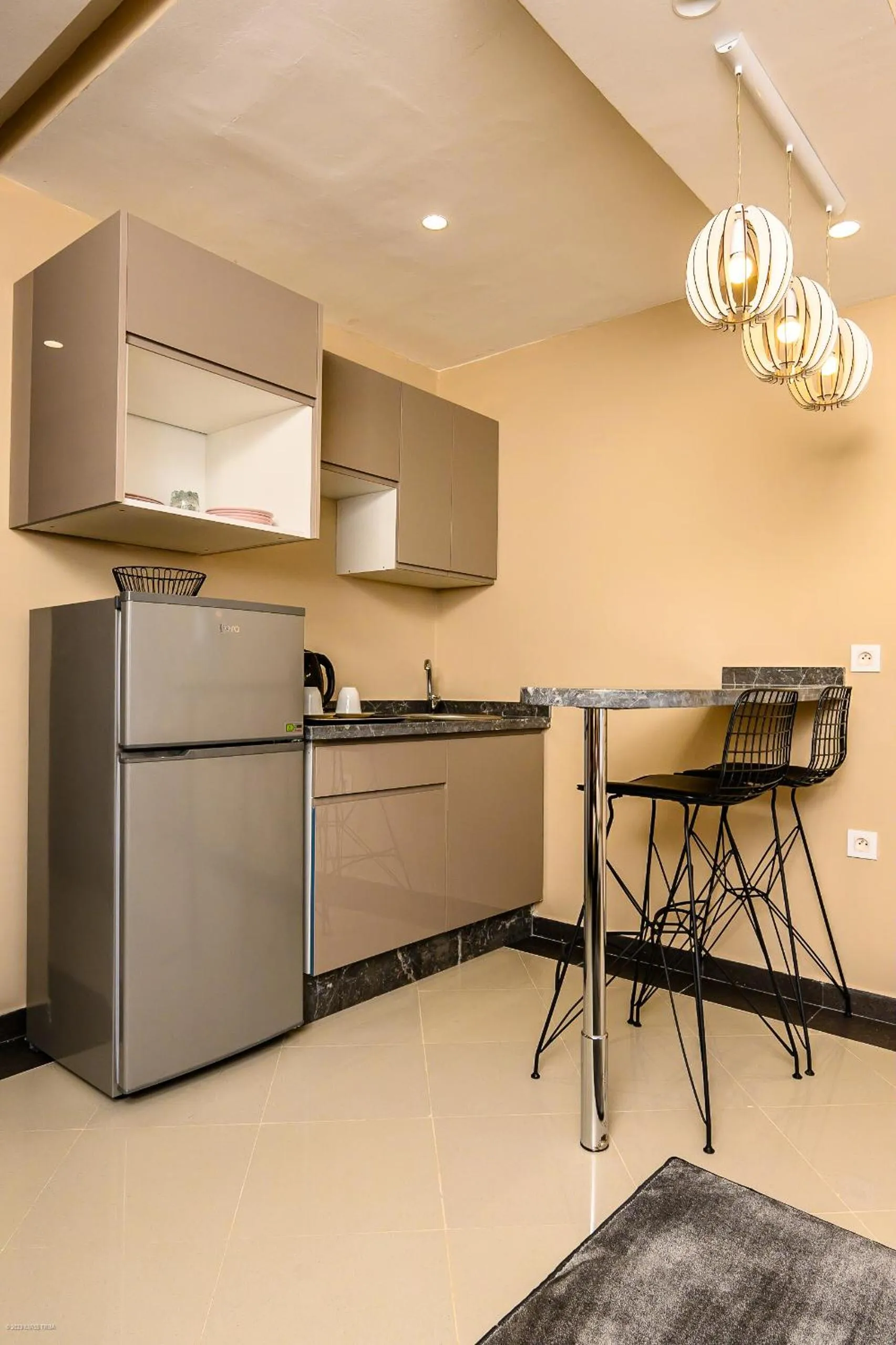 Kitchen or kitchenette in PLAYA DEL PACHA Suites Hotel
