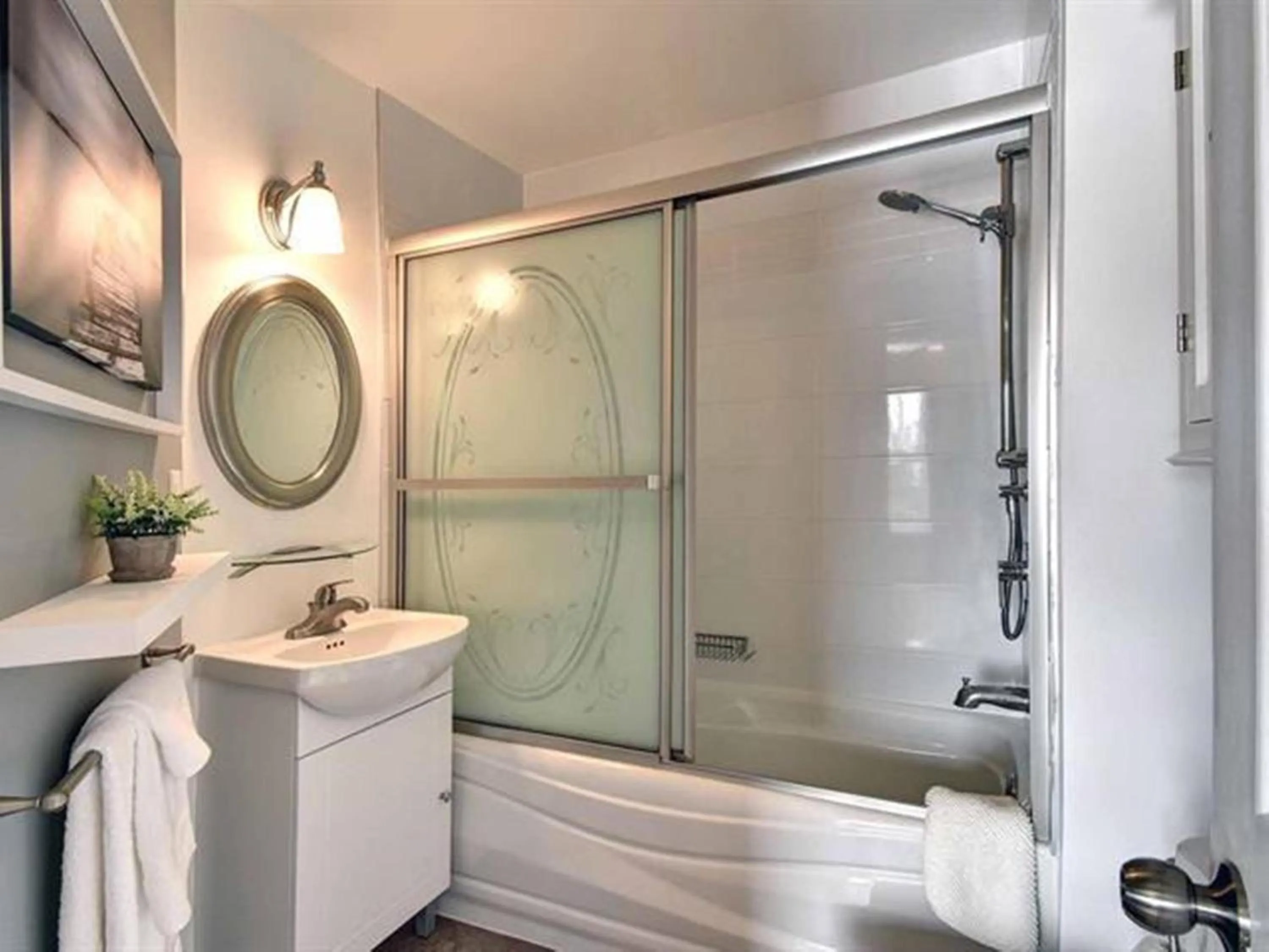 Bathroom in Bright Condo near the Lake by GLOBALSTAY