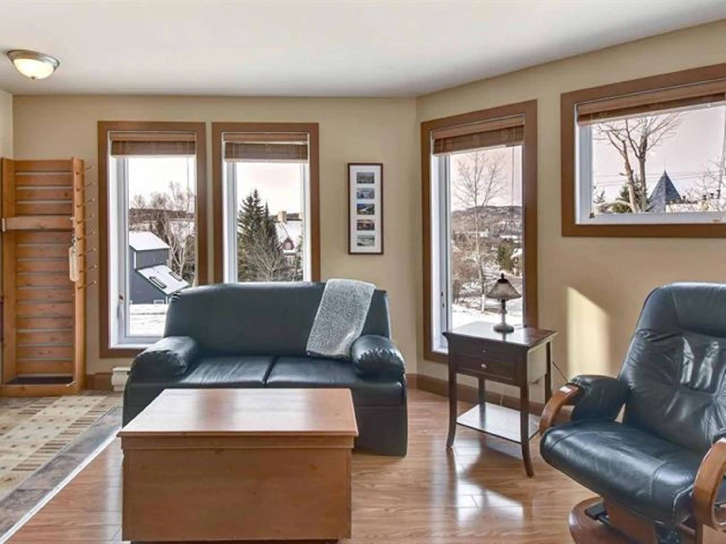 Living room in Bright Condo near the Lake by GLOBALSTAY