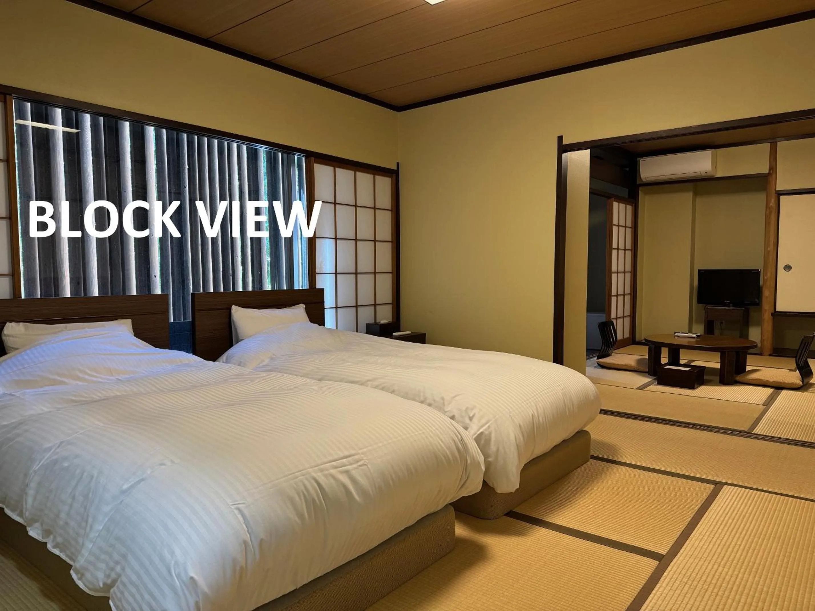 Bed in Hatago Kintoen