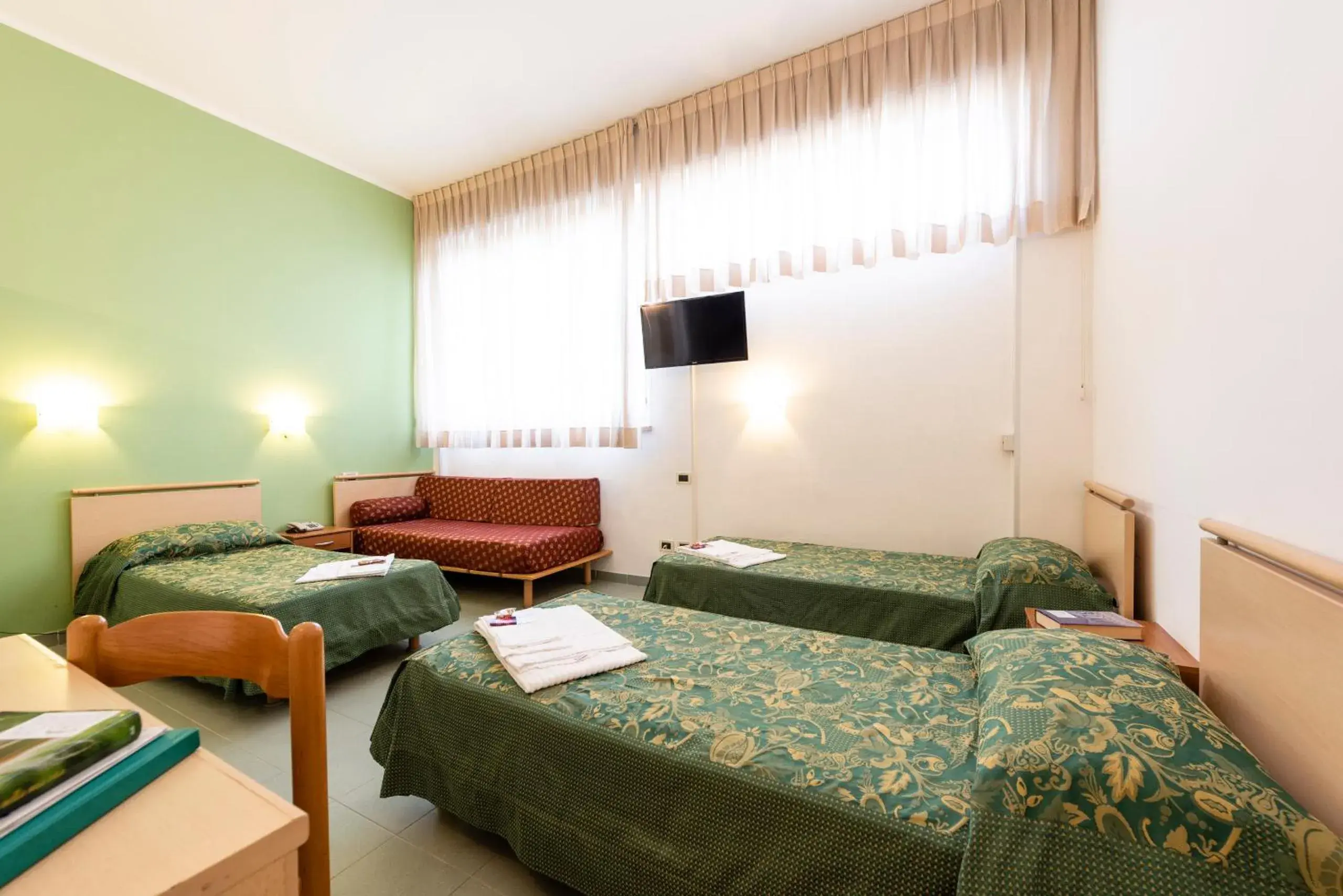 Family Room in Casa per Ferie Opera Don Calabria Family Room in Casa per Ferie Opera Don Calabria