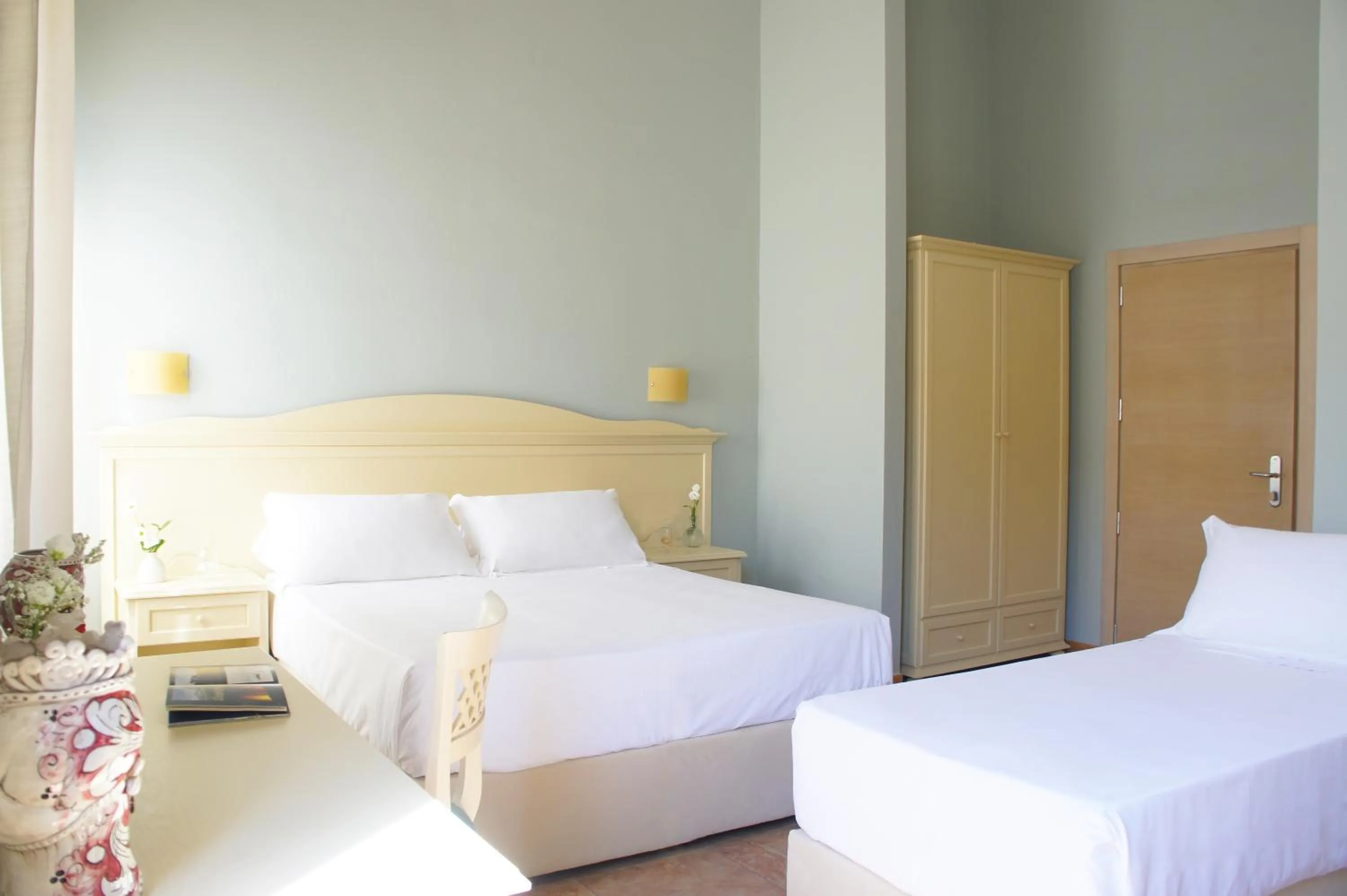 Bed in Hotel le Muse