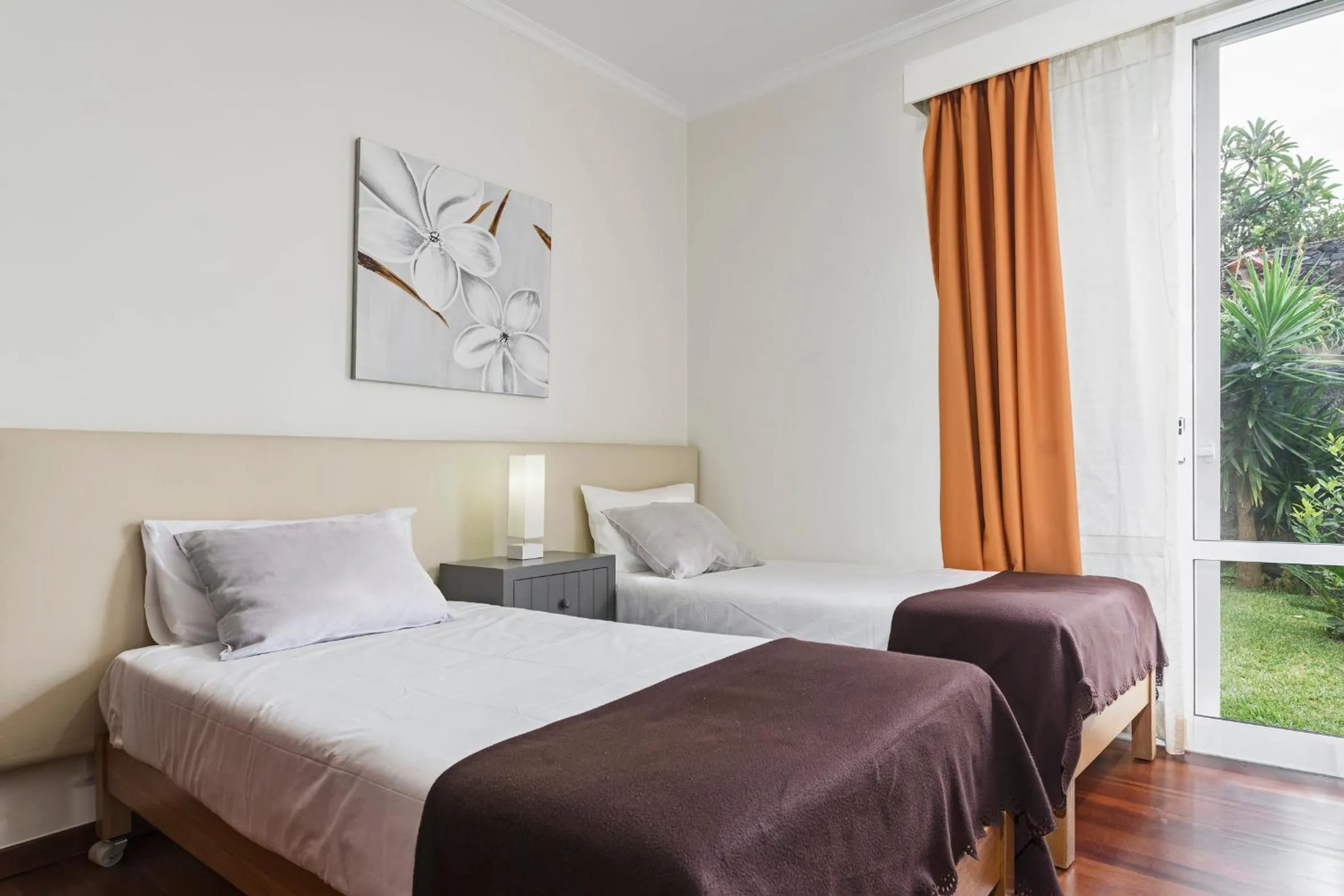 Bed in Achada I by An Island Apart