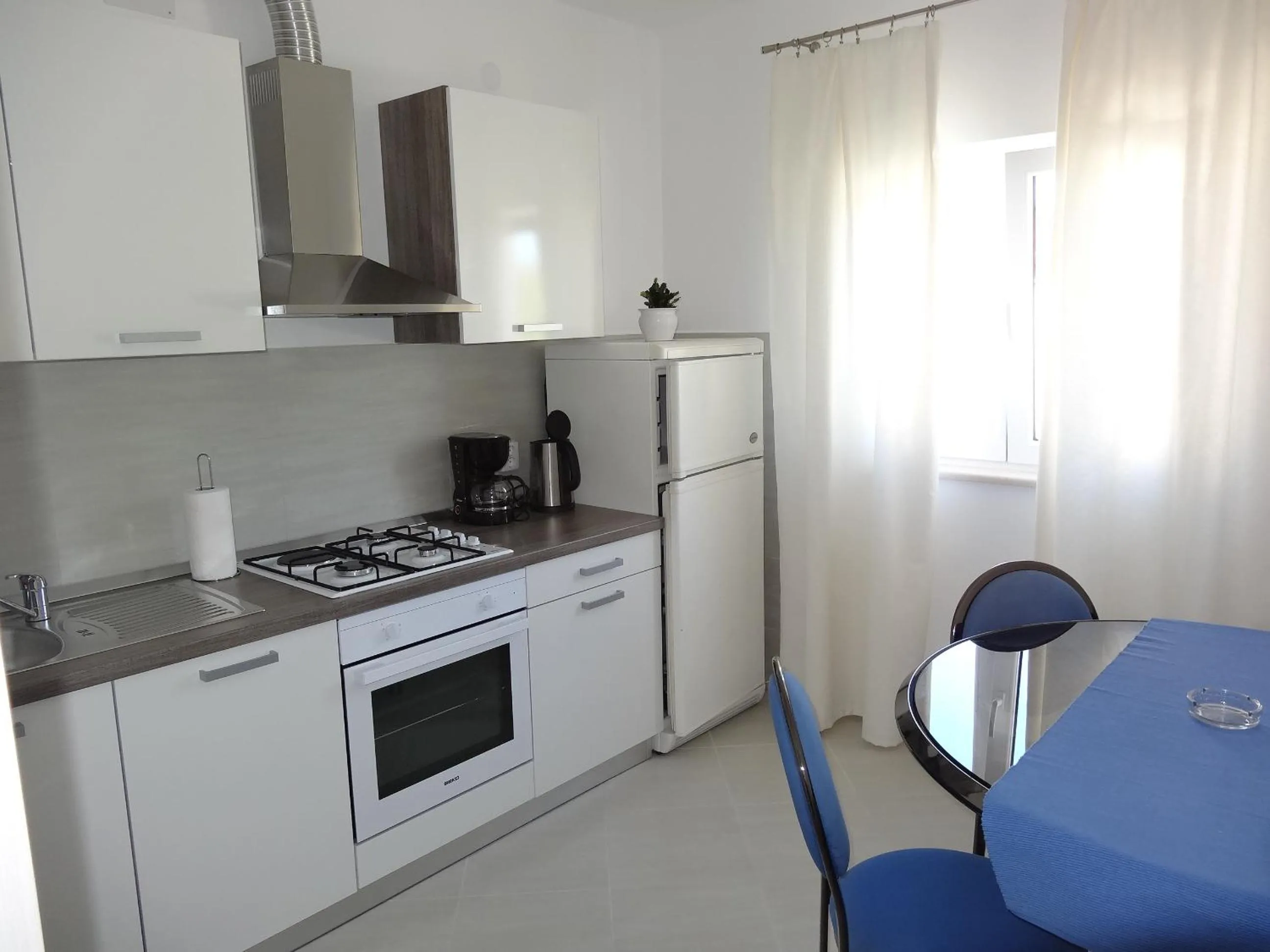 Kitchen or kitchenette in Apartments Roko