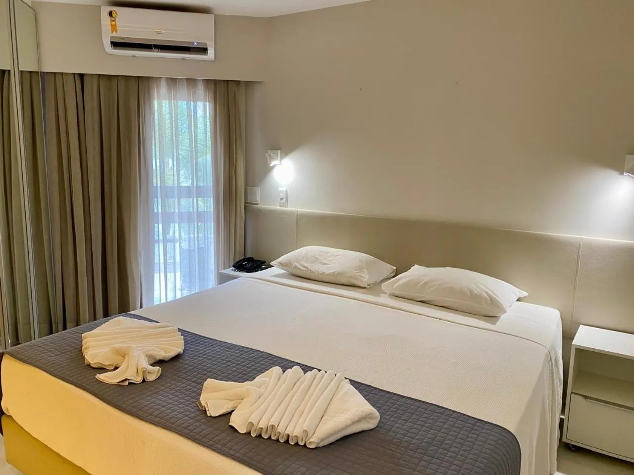 Bed in Jatiuca Suítes Resort FLAT