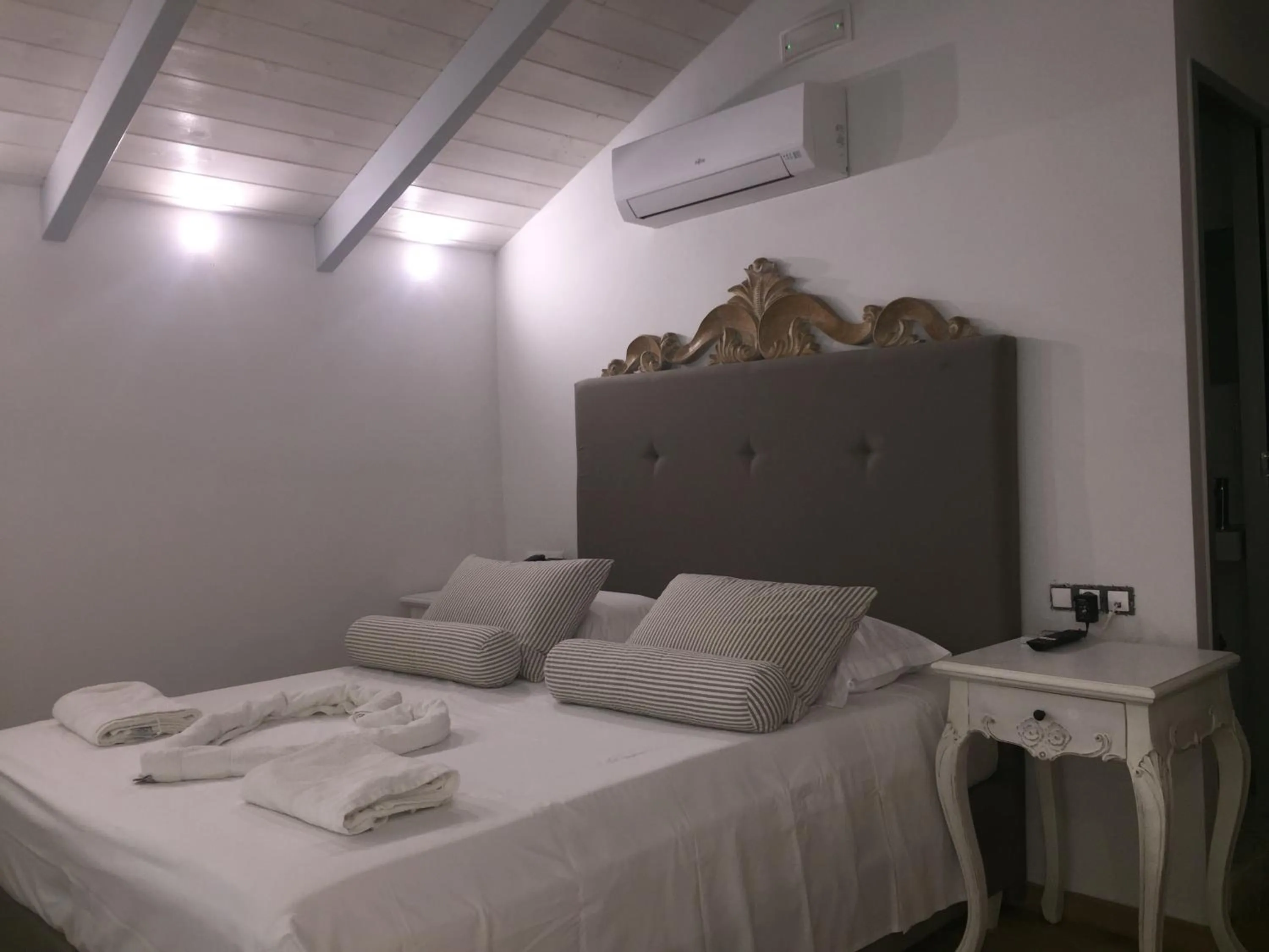 Bed in Porto Enetiko Suites
