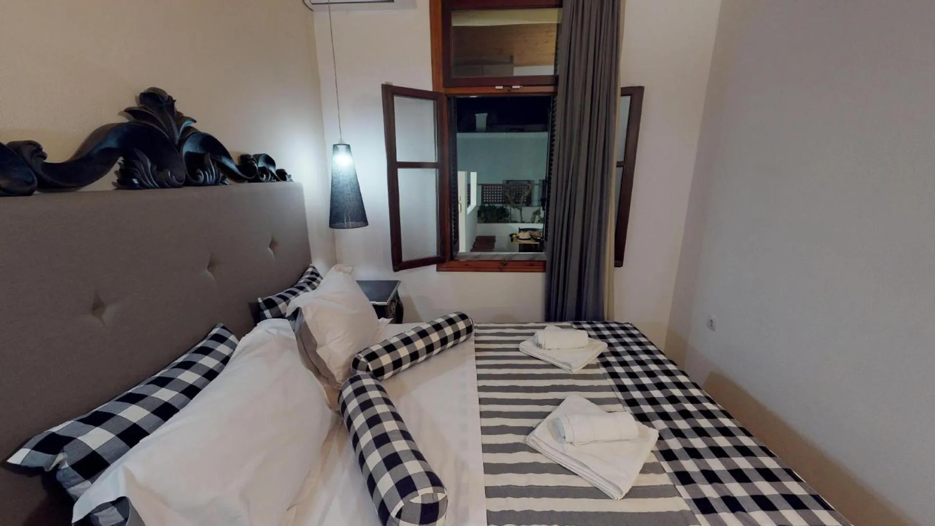 Bed in Porto Enetiko Suites