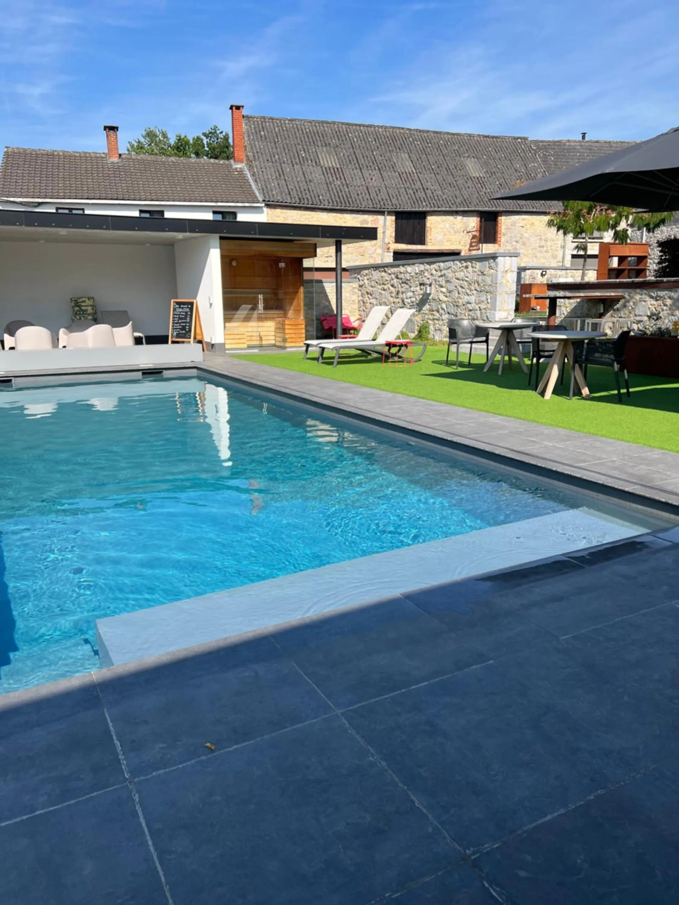 Pool view in Le Presbytère de Sautour