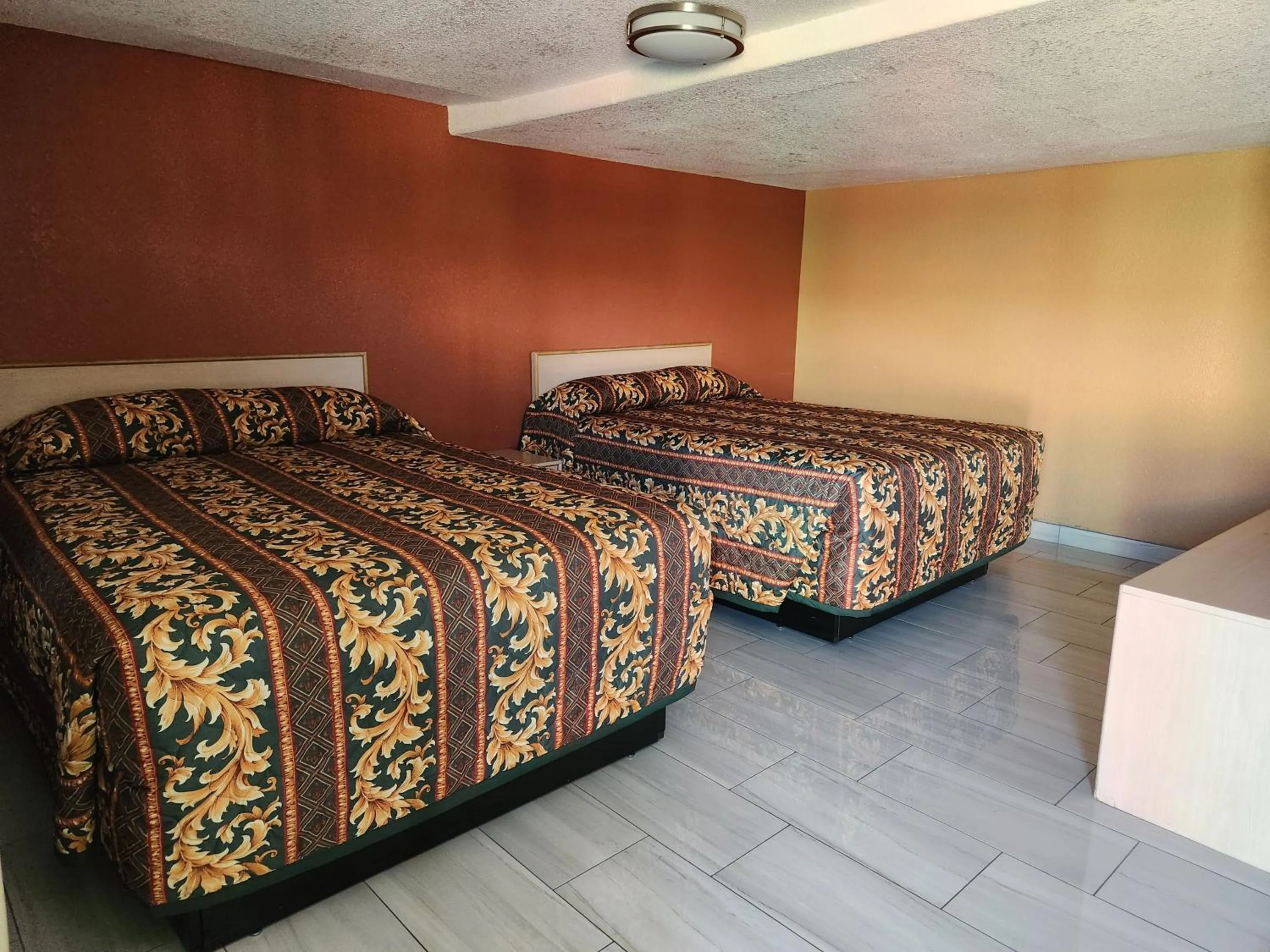 Bed in Two Palms Motel