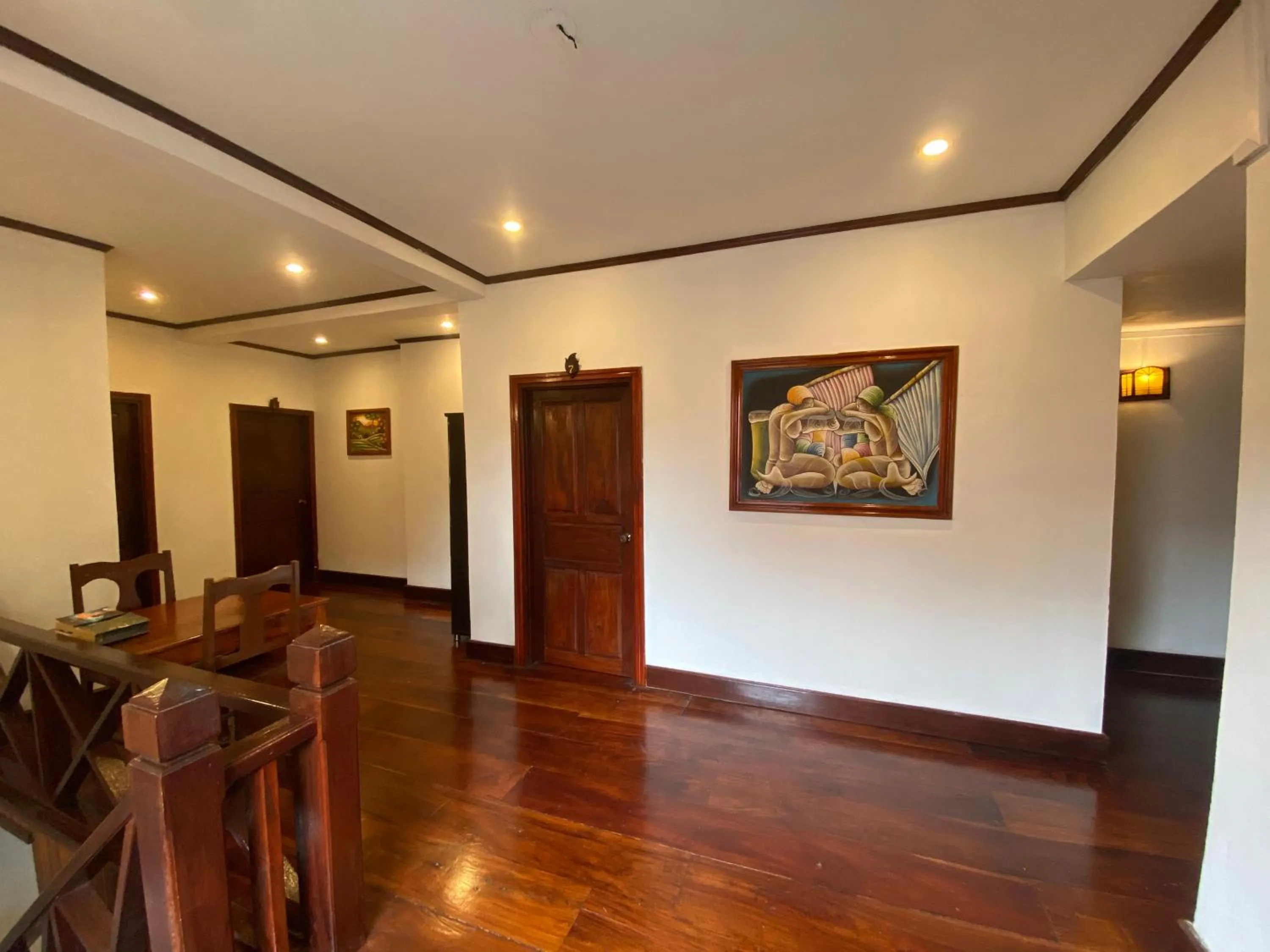 Communal lounge/ TV room in Golden Lotus Boutique Hotel