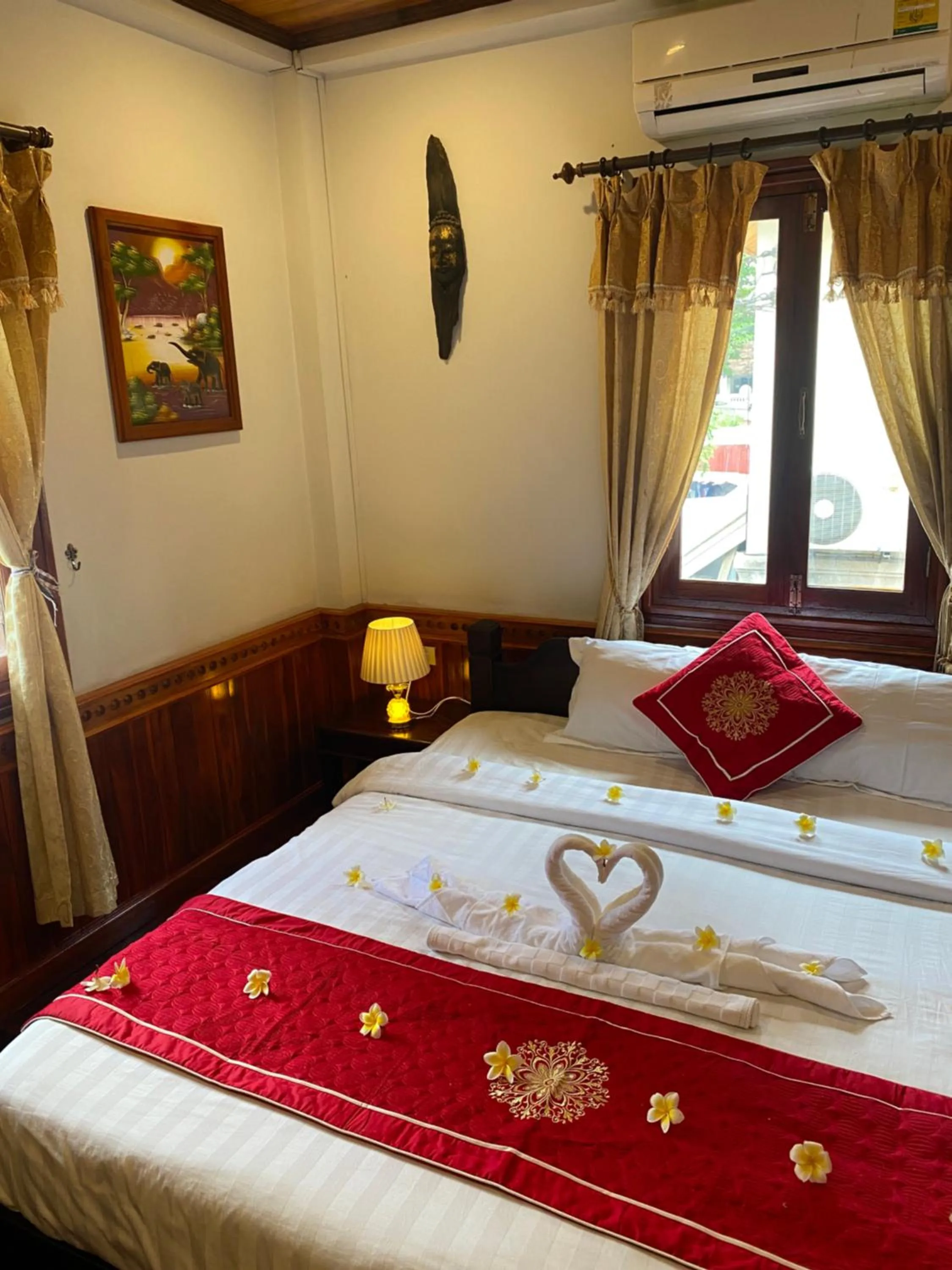 Bed in Golden Lotus Boutique Hotel