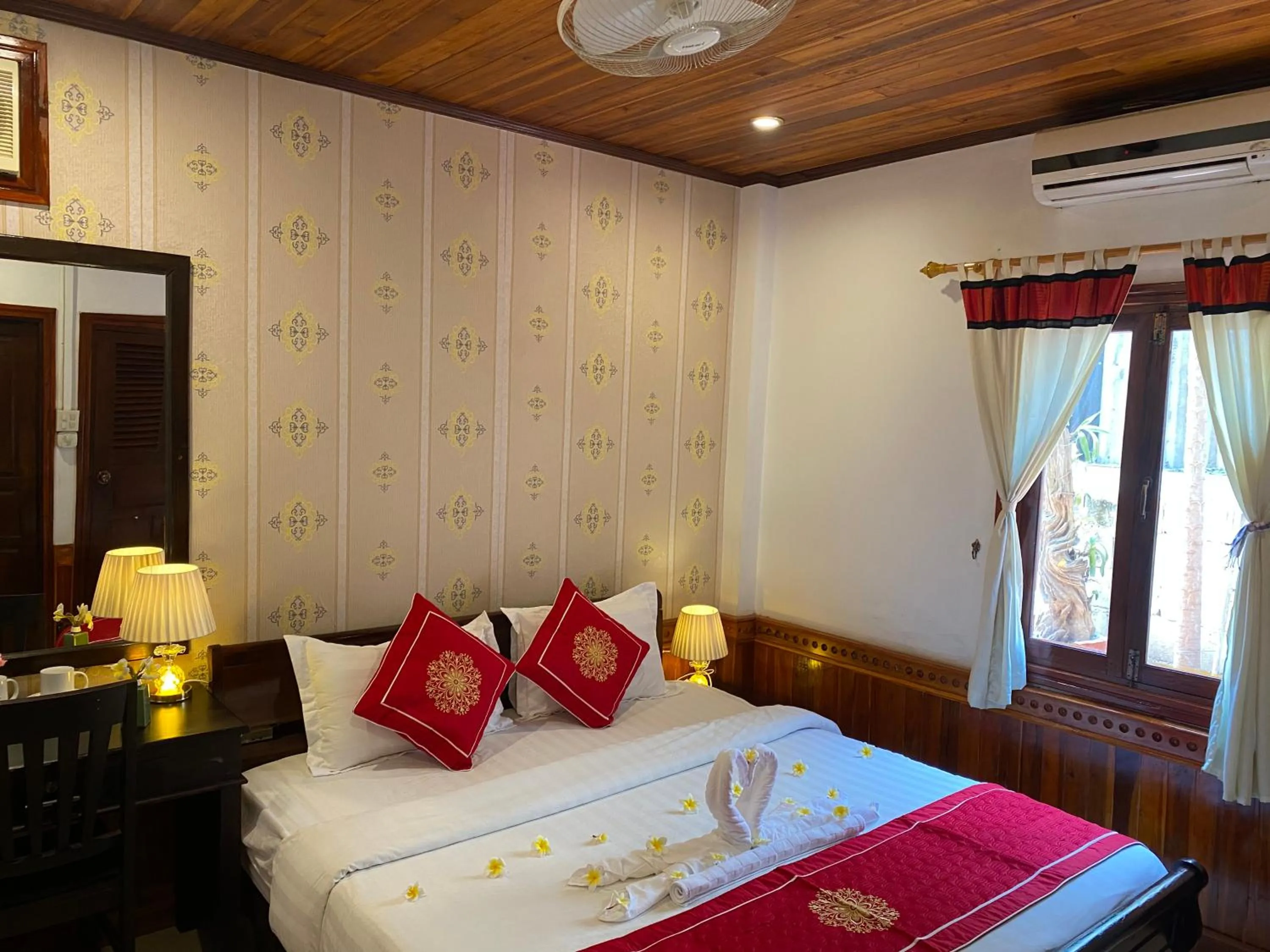 Bed in Golden Lotus Boutique Hotel