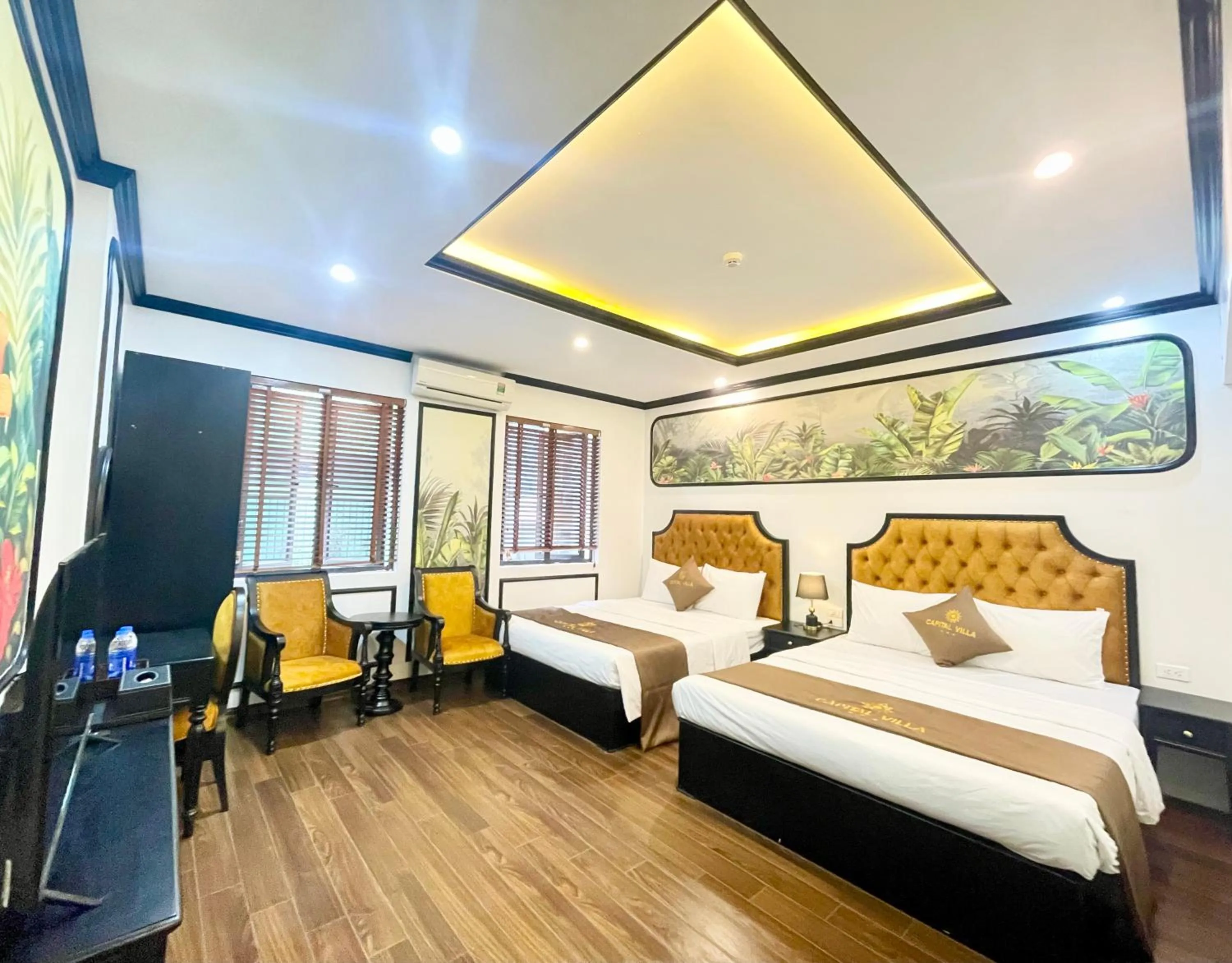 Living room, Bed in Capital CauGiay Hotel