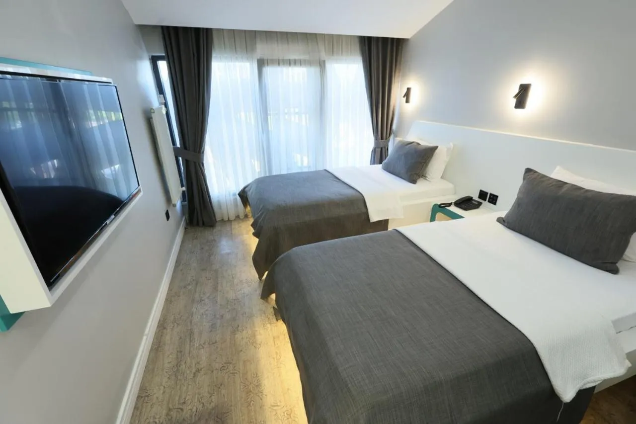 Bed in Midis Otel