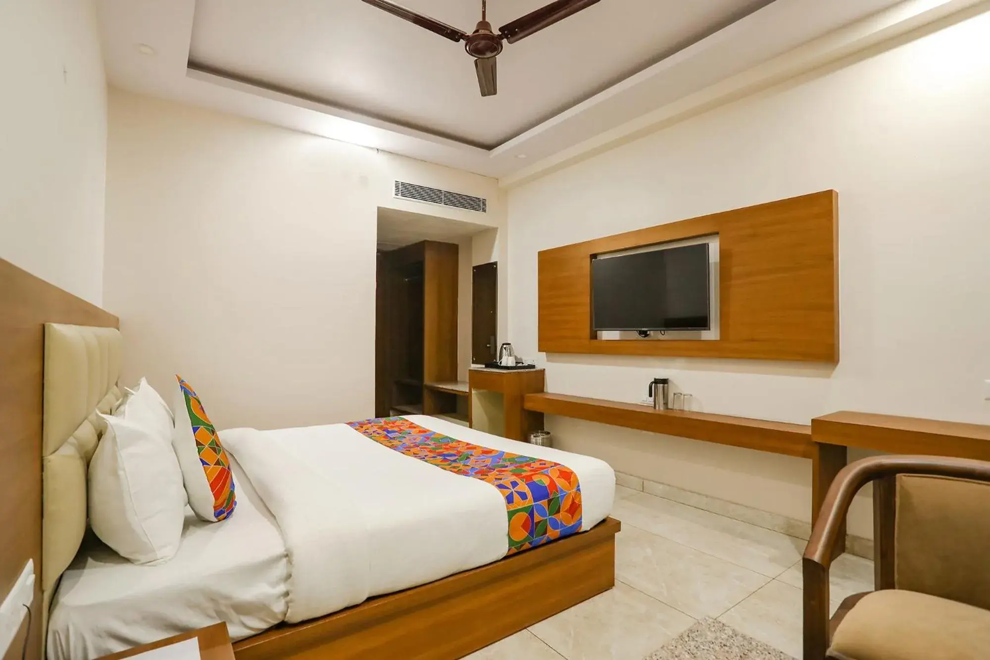 Communal lounge/ TV room, Bed in FabHotel Aman Sara Communal lounge/ TV room, Bed in FabHotel Aman Sara