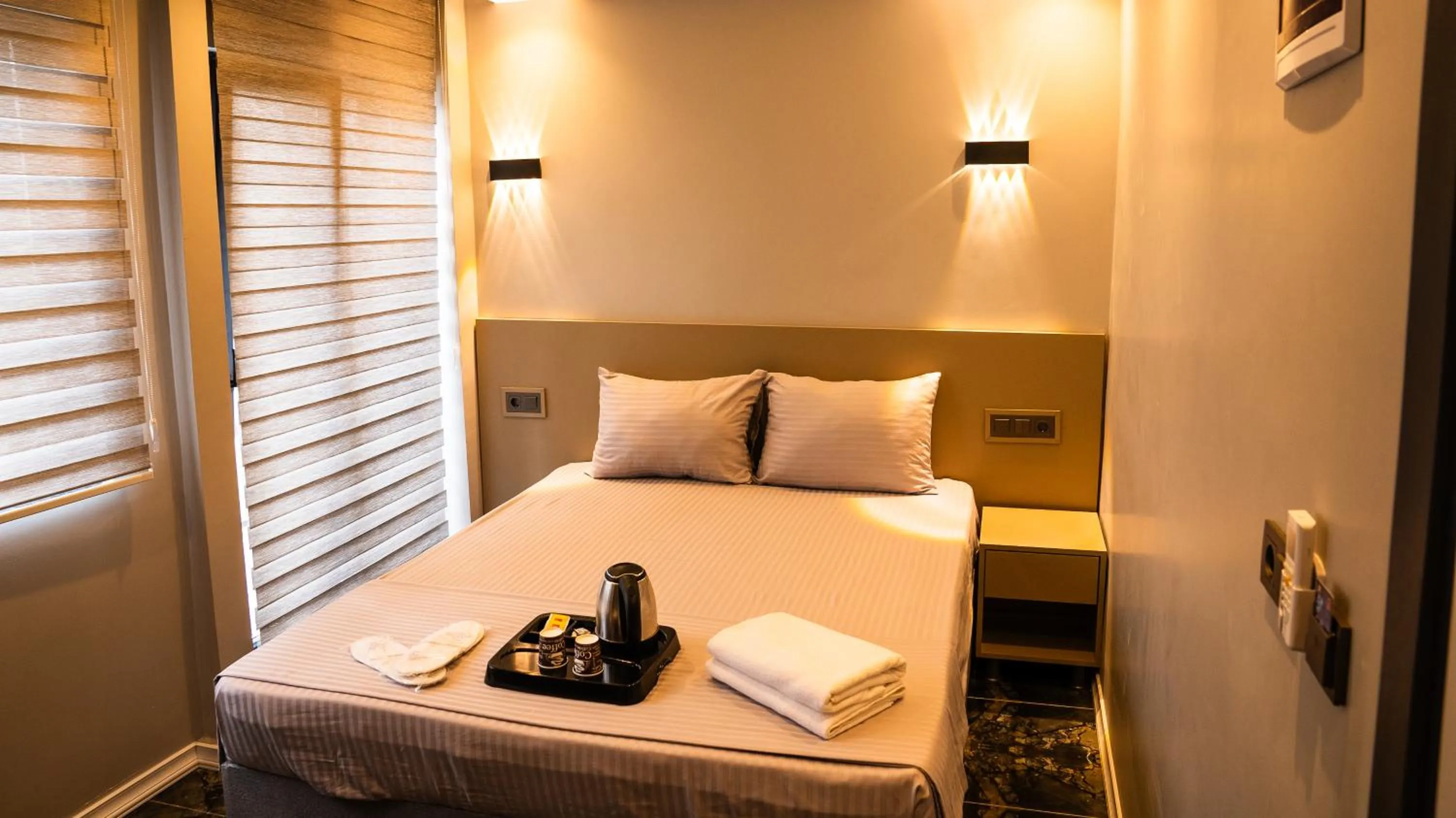 Bed in CK PALACE Hotel