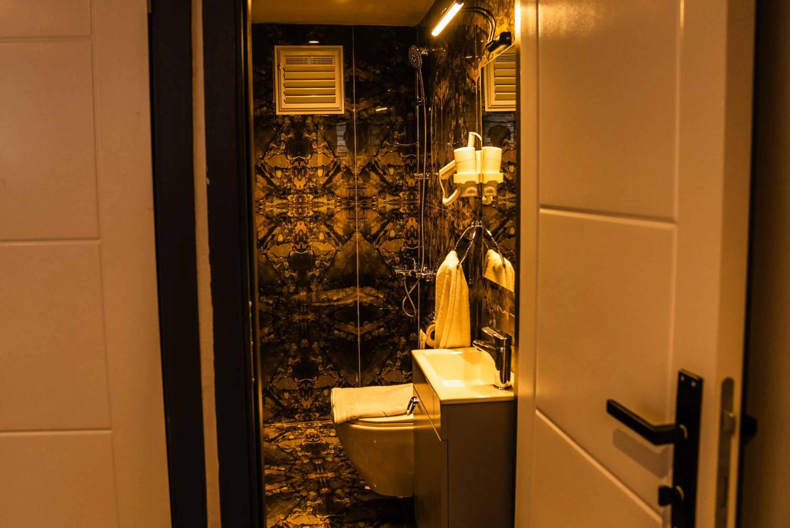 Bathroom in CK PALACE Hotel