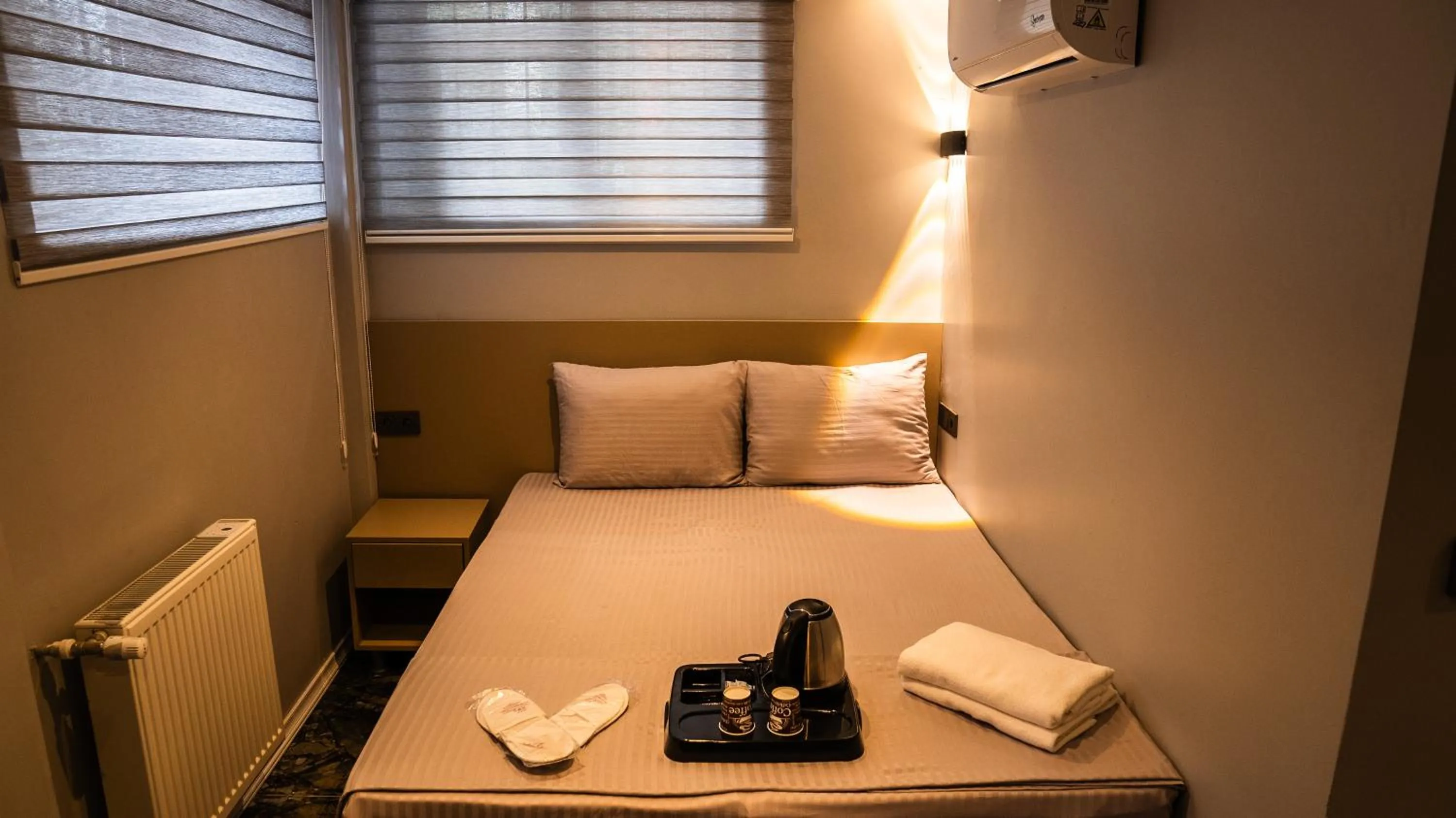 Bed in CK PALACE Hotel