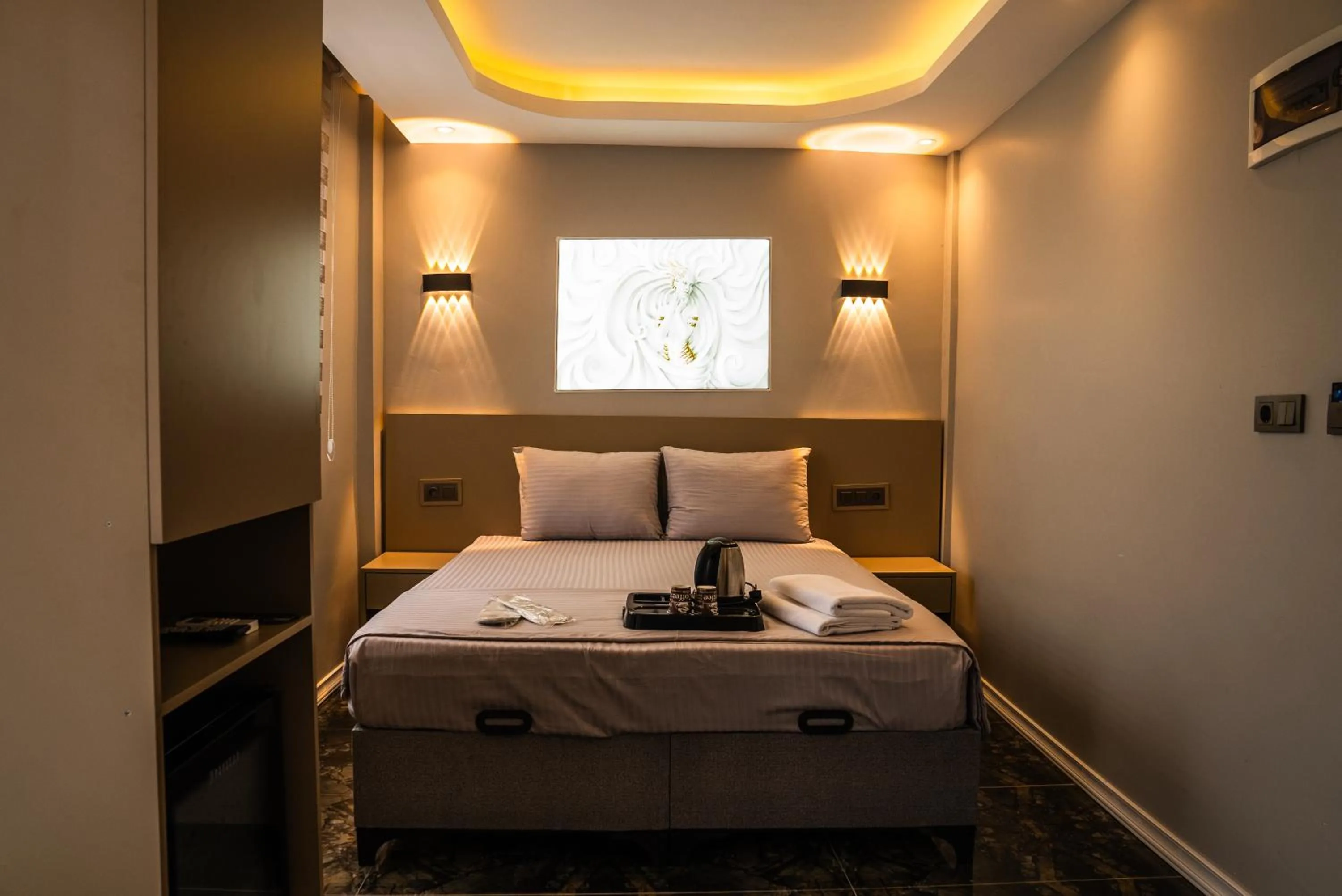 Bed in CK PALACE Hotel