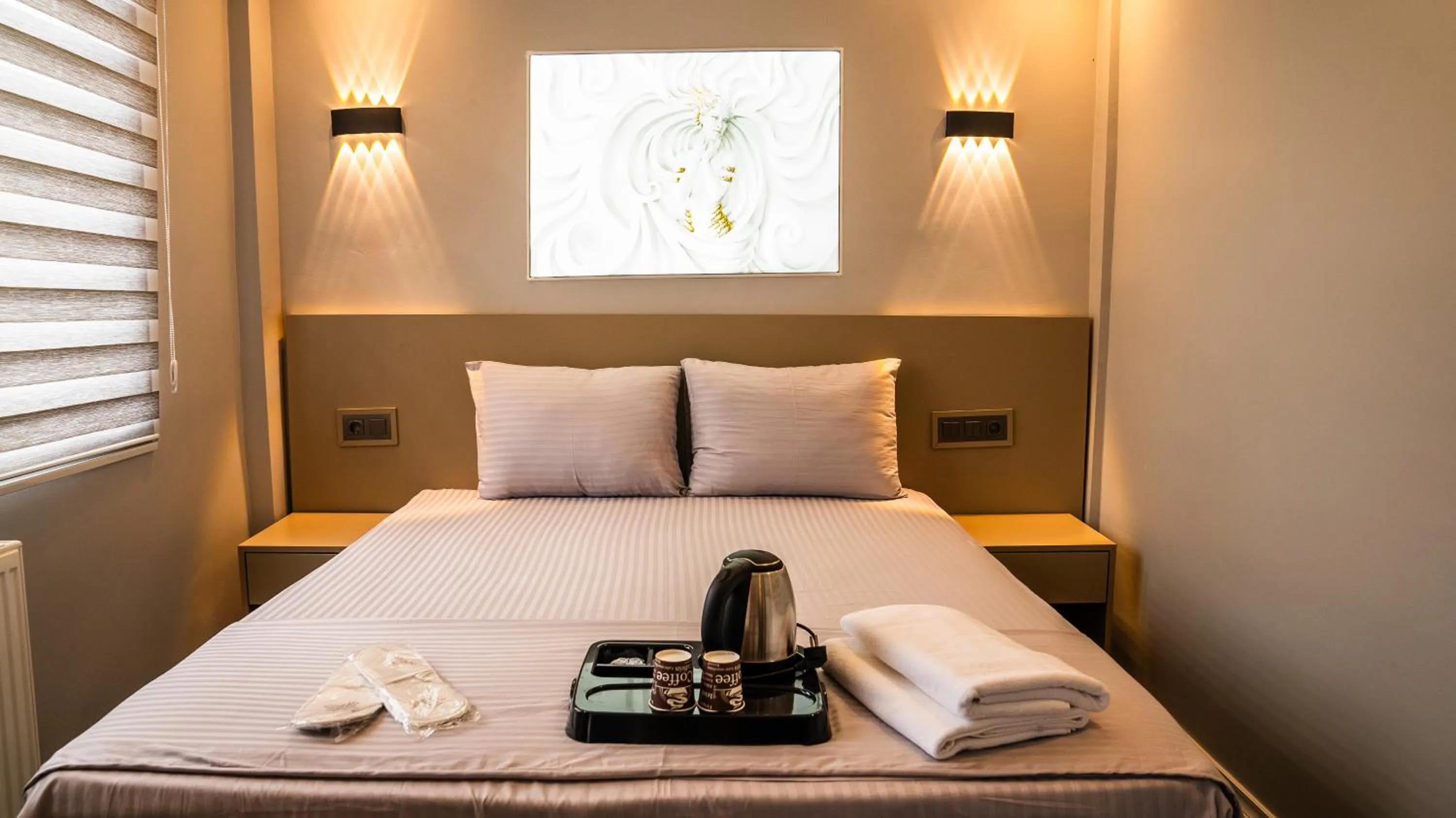 Bed in CK PALACE Hotel