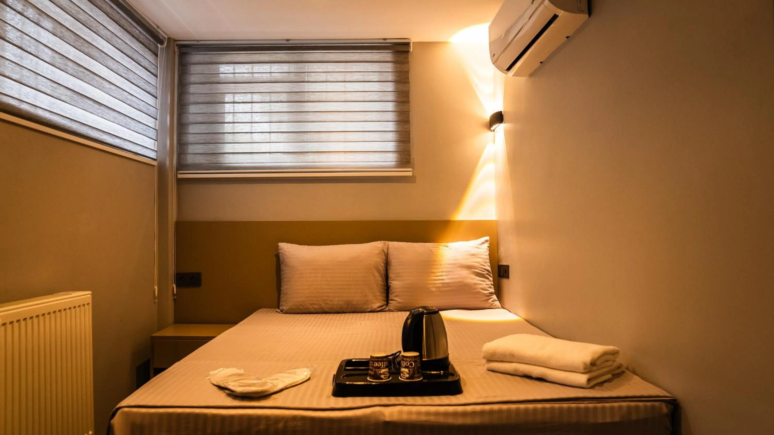 Bed in CK PALACE Hotel