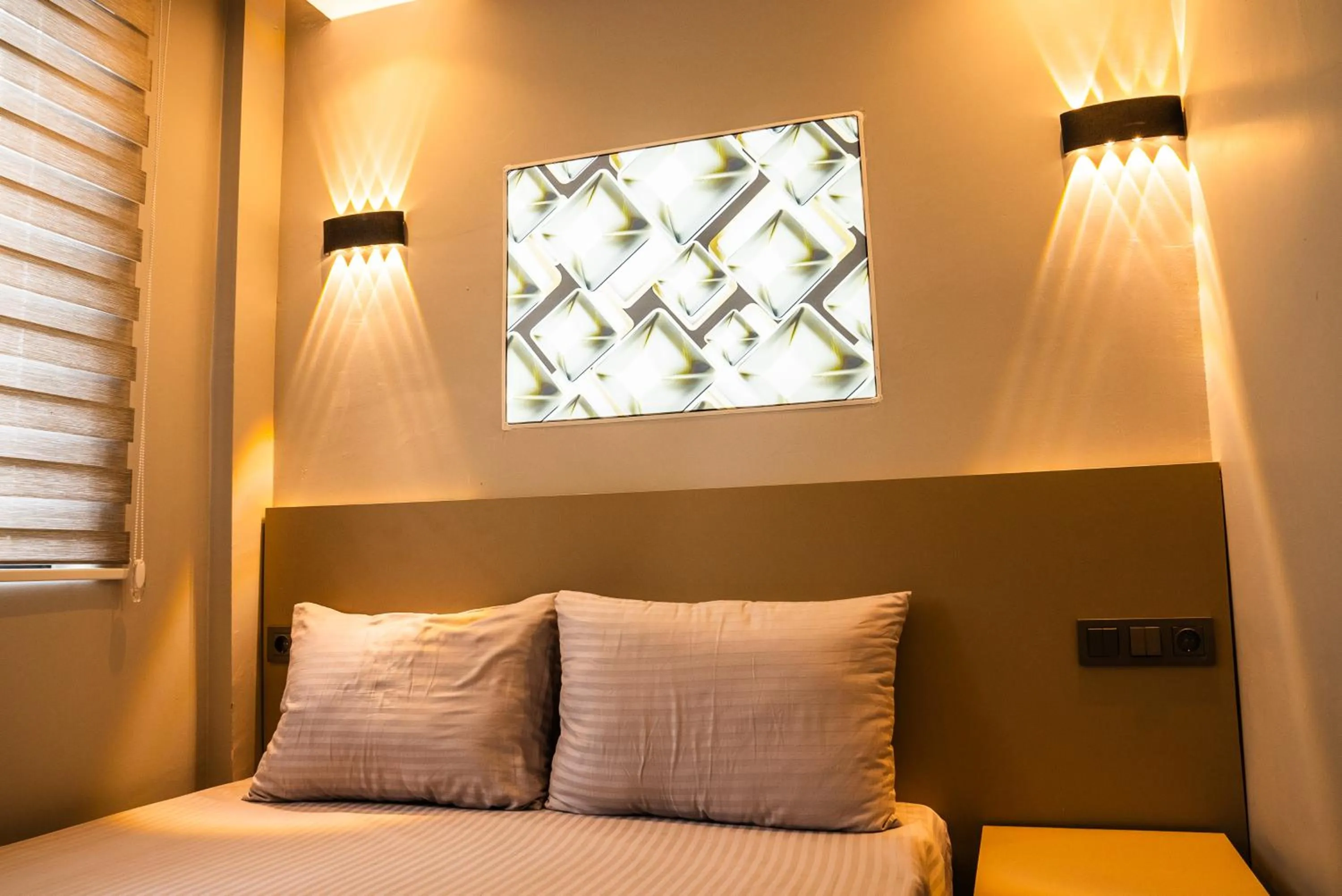 Bed in CK PALACE Hotel