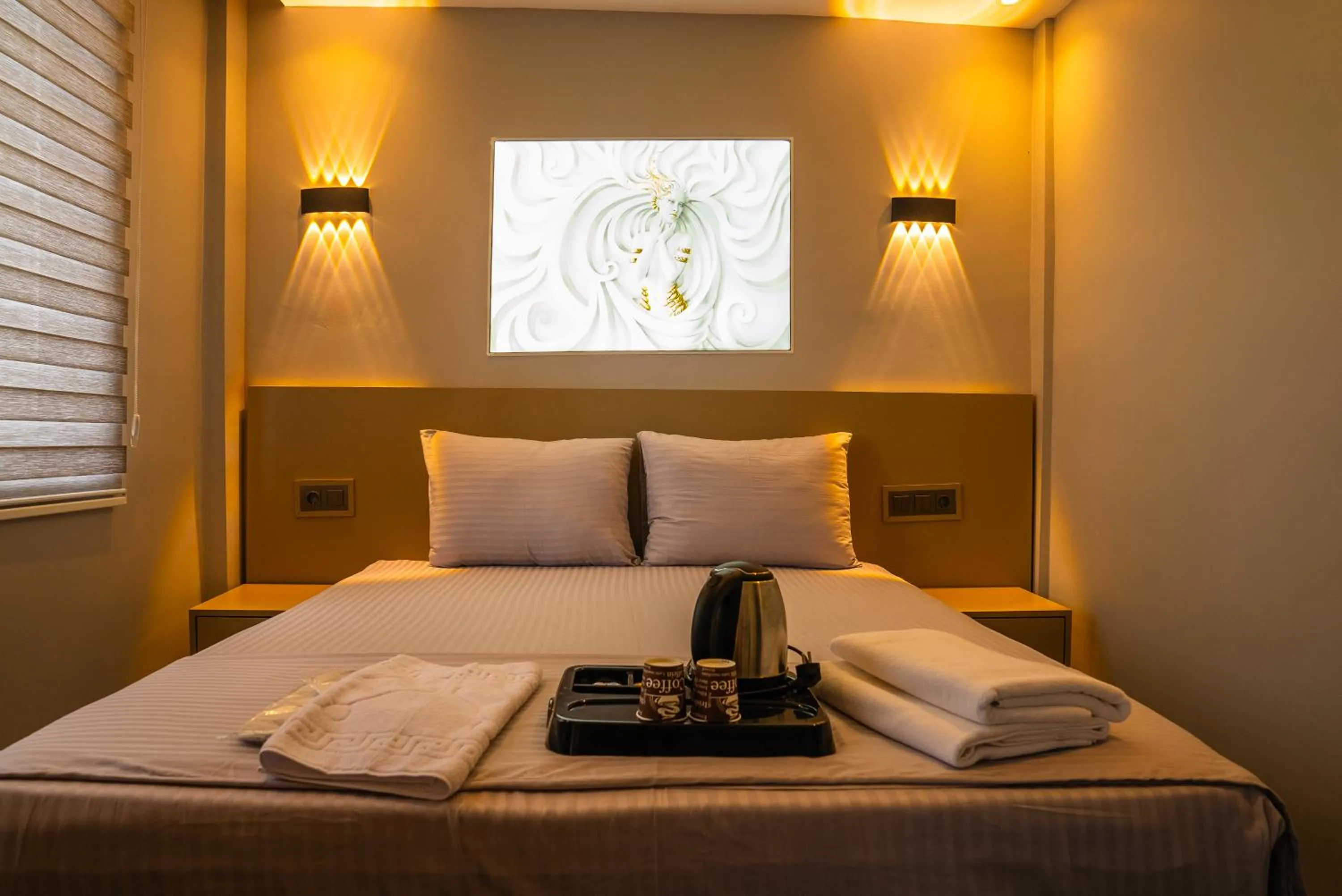 Bed in CK PALACE Hotel