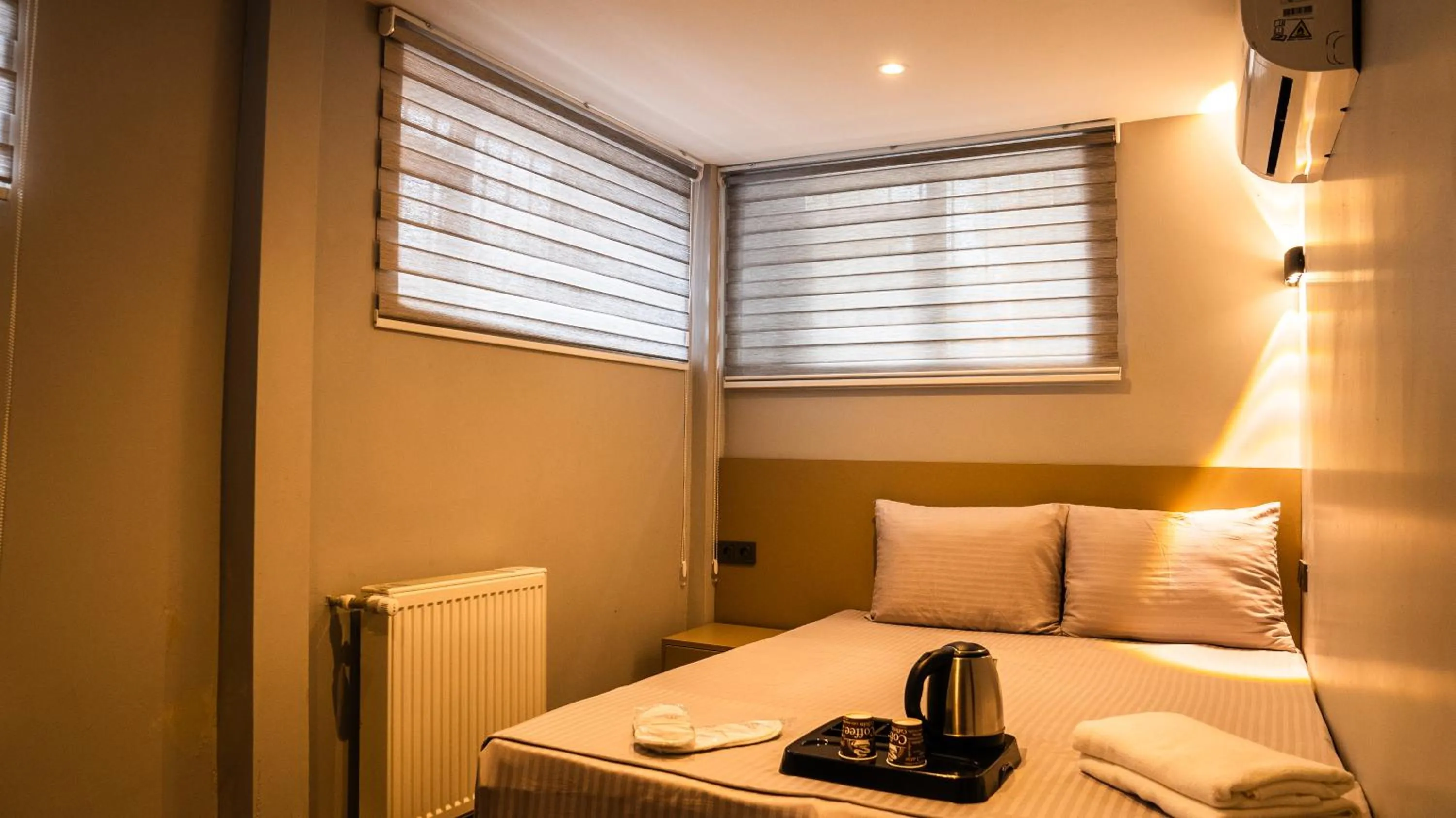 Bed in CK PALACE Hotel