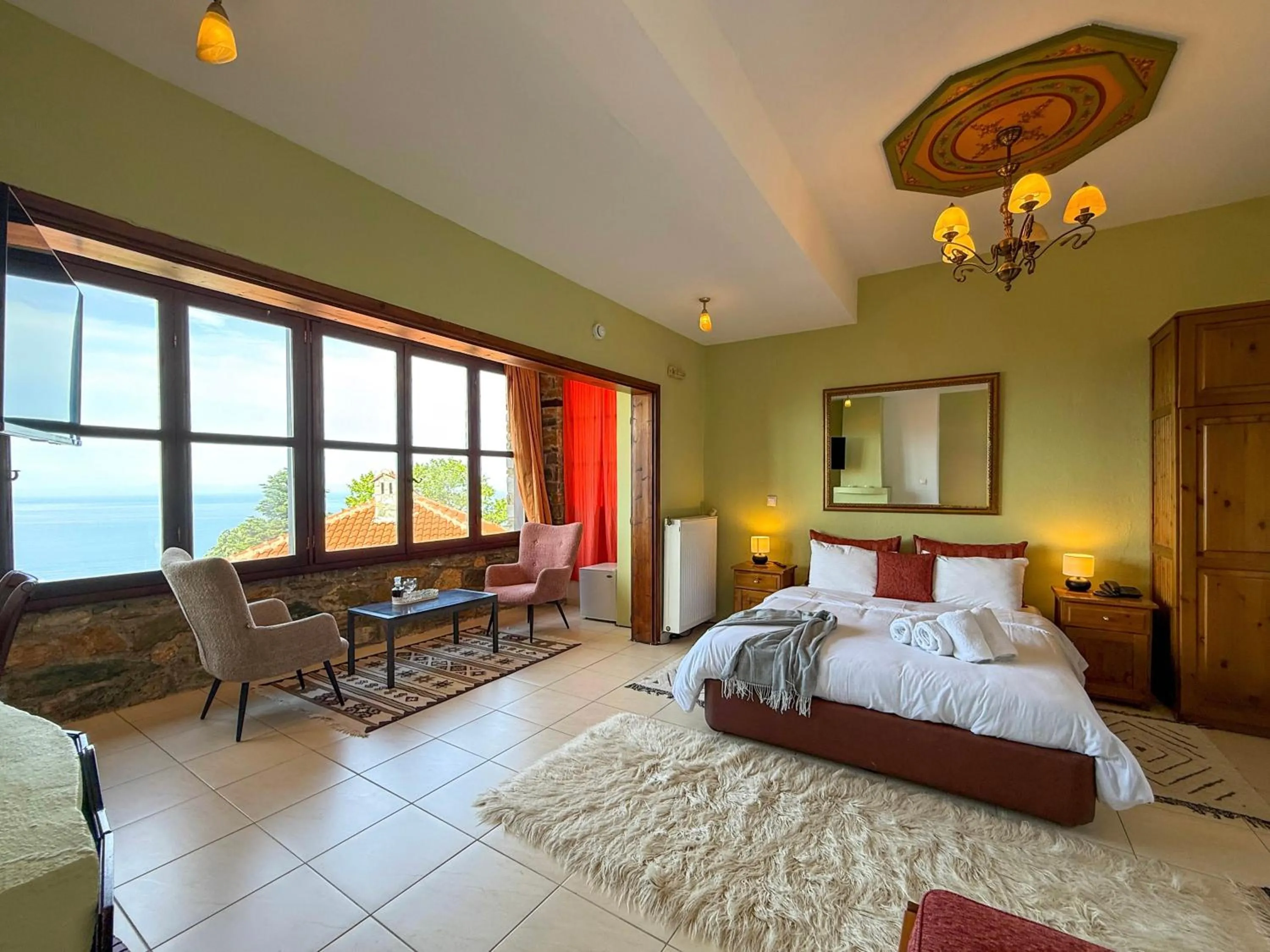 Deluxe Suite with Sea View in Pliades Traditional Guesthouse