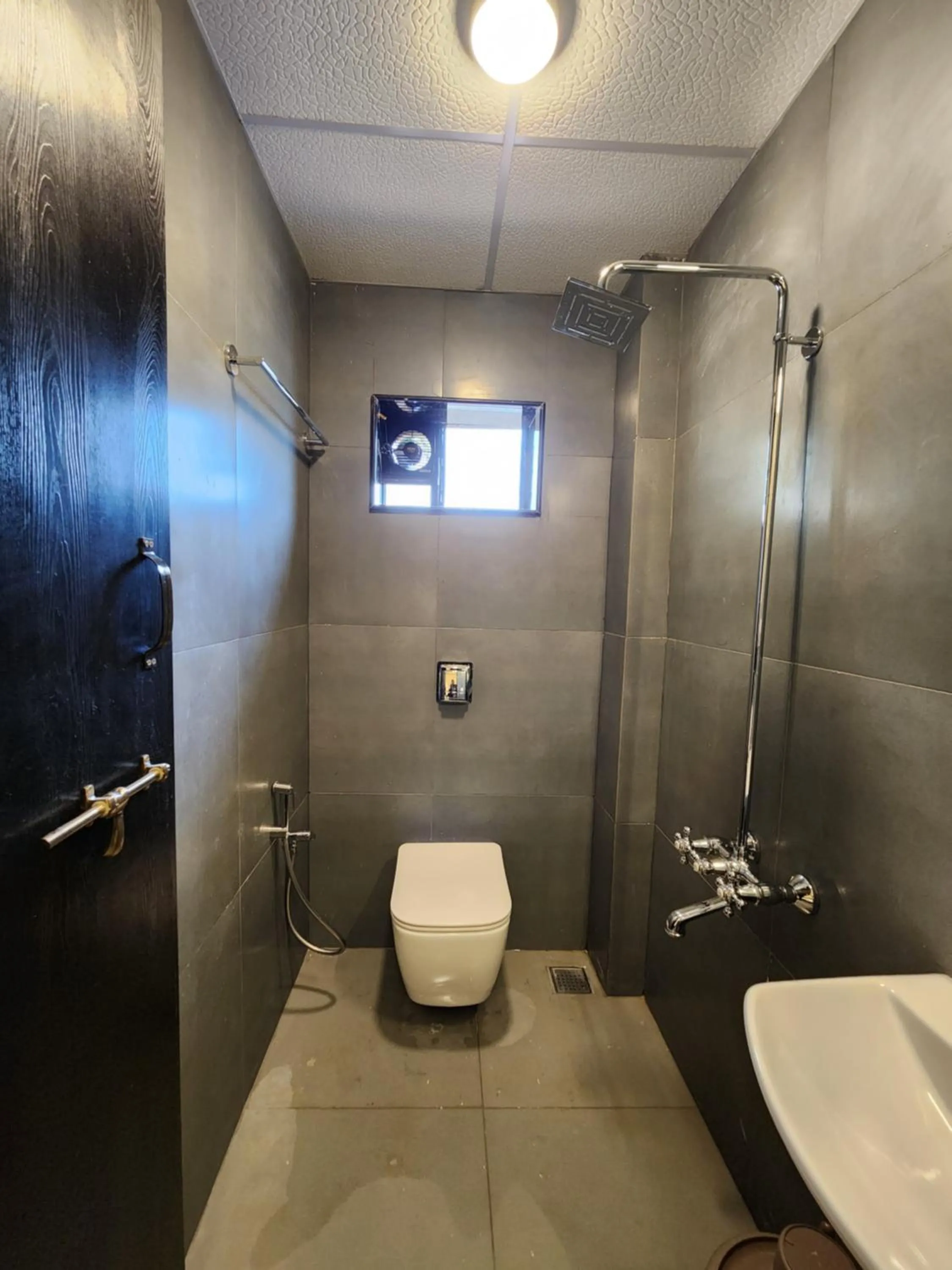 Shower in Udupi Comforts