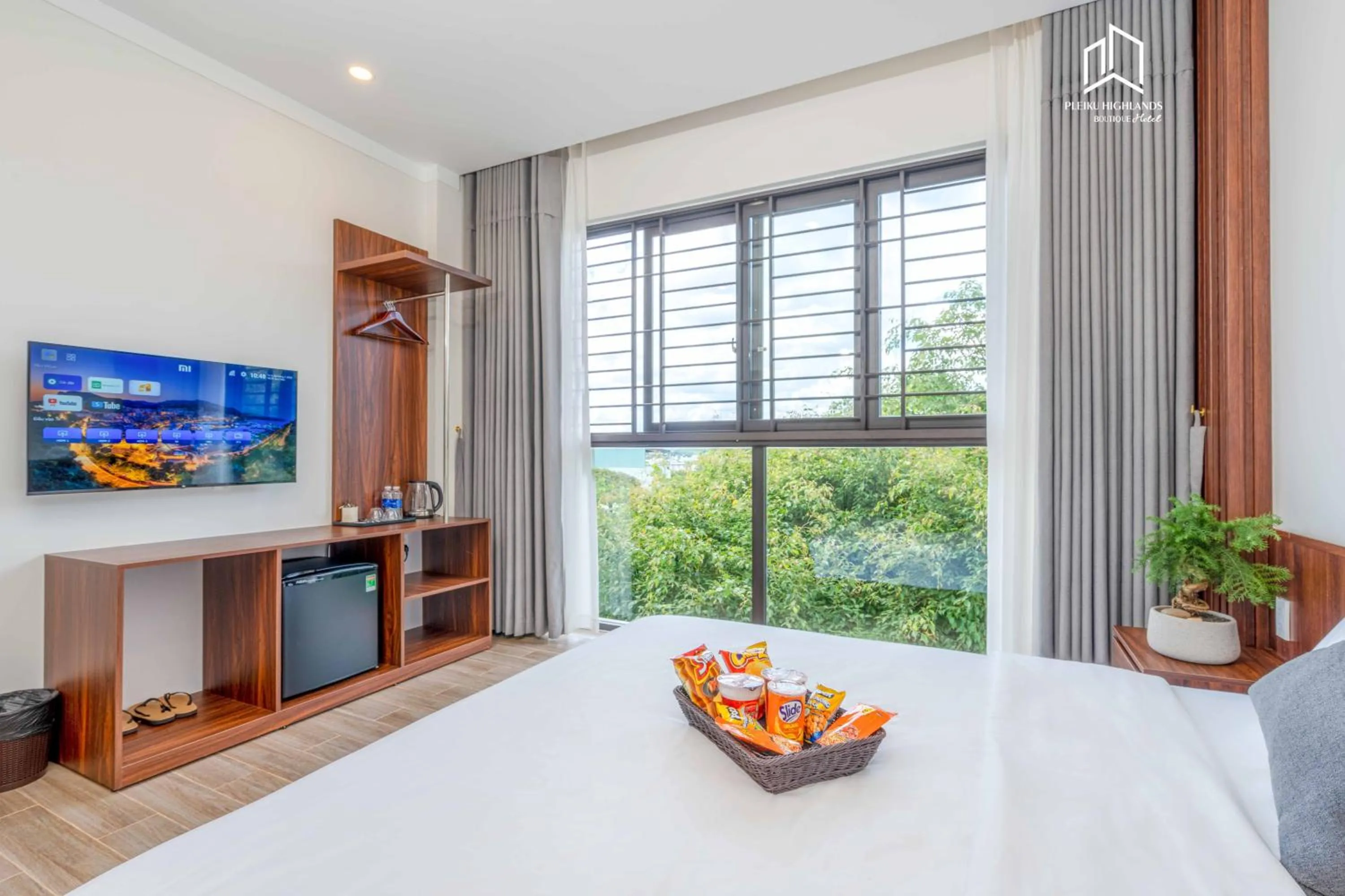 View (from property/room), Bed in PLEIKU HIGHLANDS BOUTIQUE HOTEL