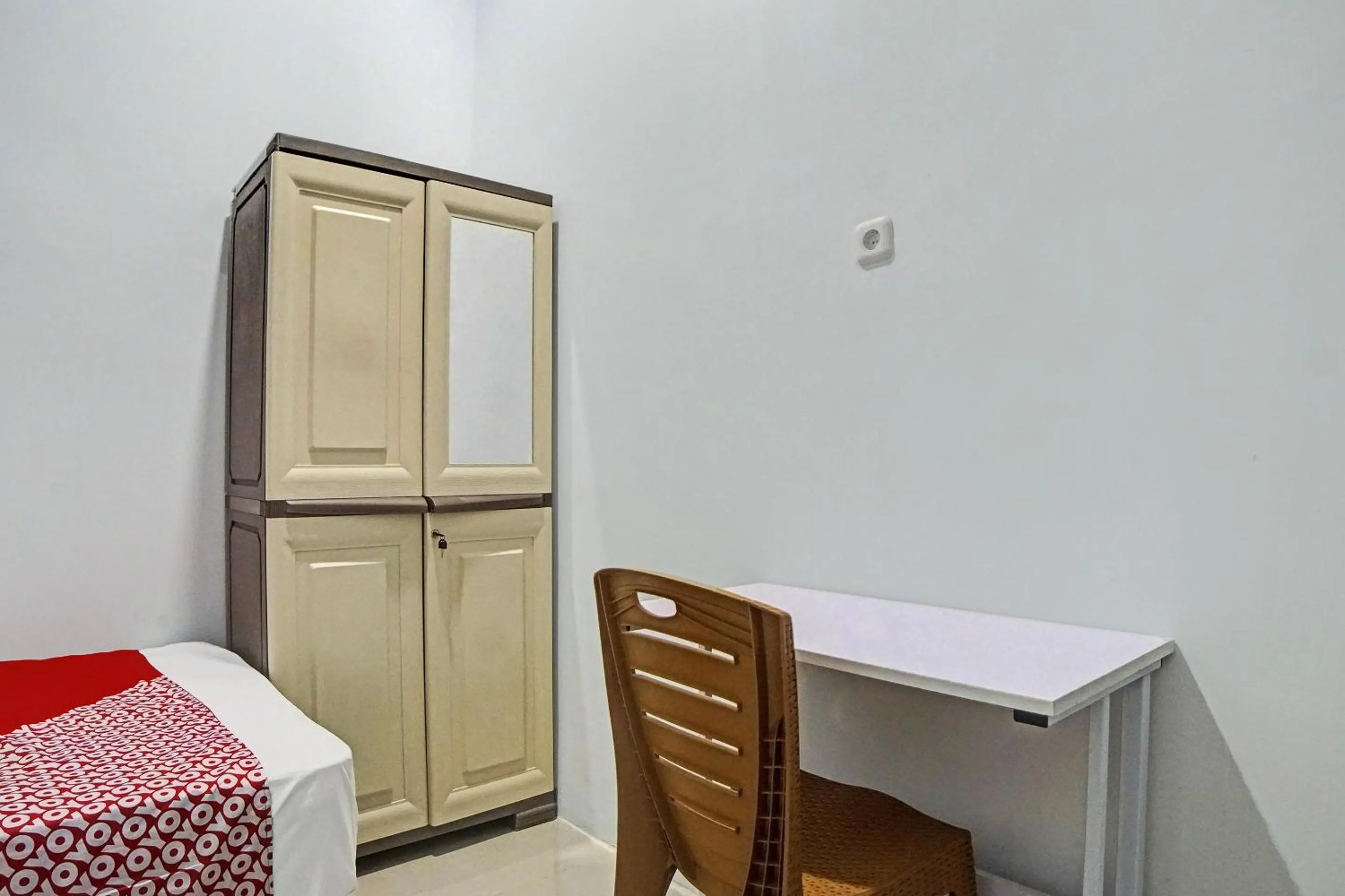 Bedroom in Hotel O Planet Guest House Syariah