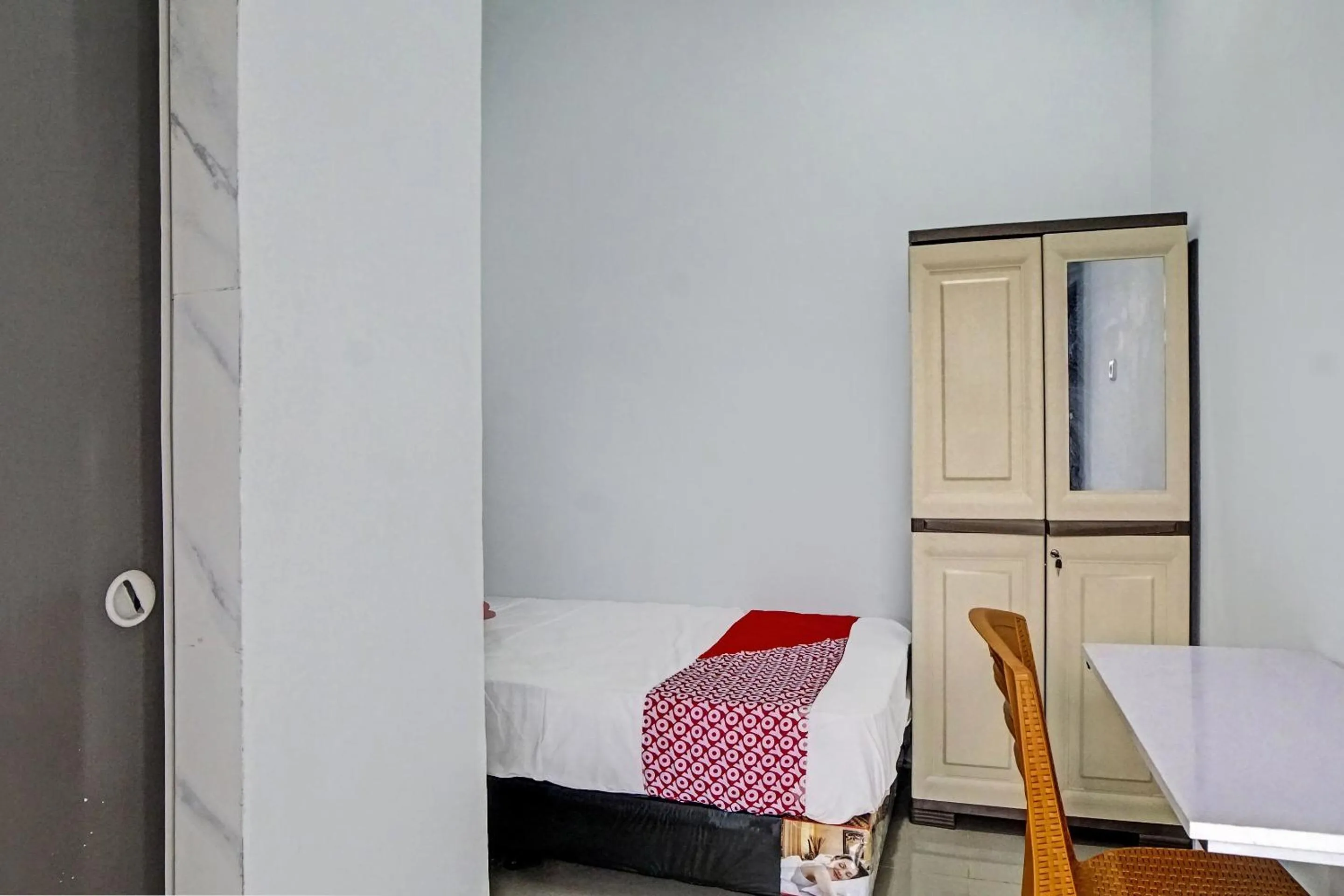 Bedroom in Hotel O Planet Guest House Syariah