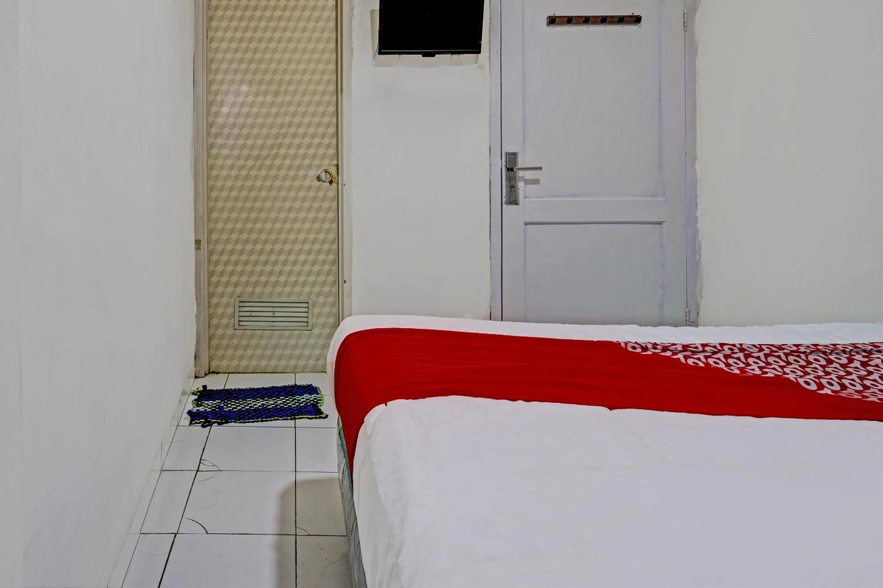 Bedroom in Hotel O Geulis Guest House Syariah
