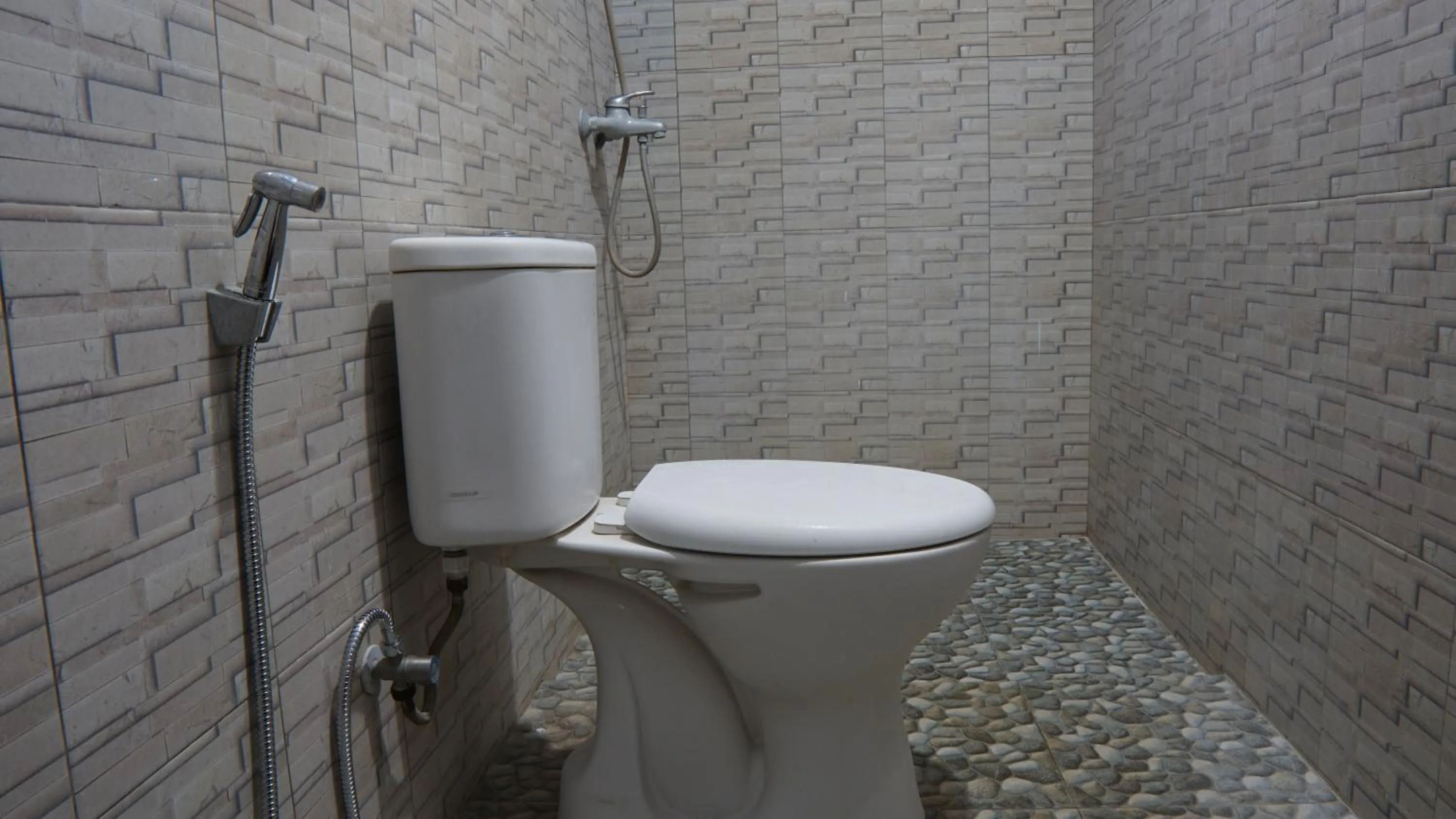 Bathroom in Hotel O Coconut Island Homestay & ResortNearPantai Pulau Merah