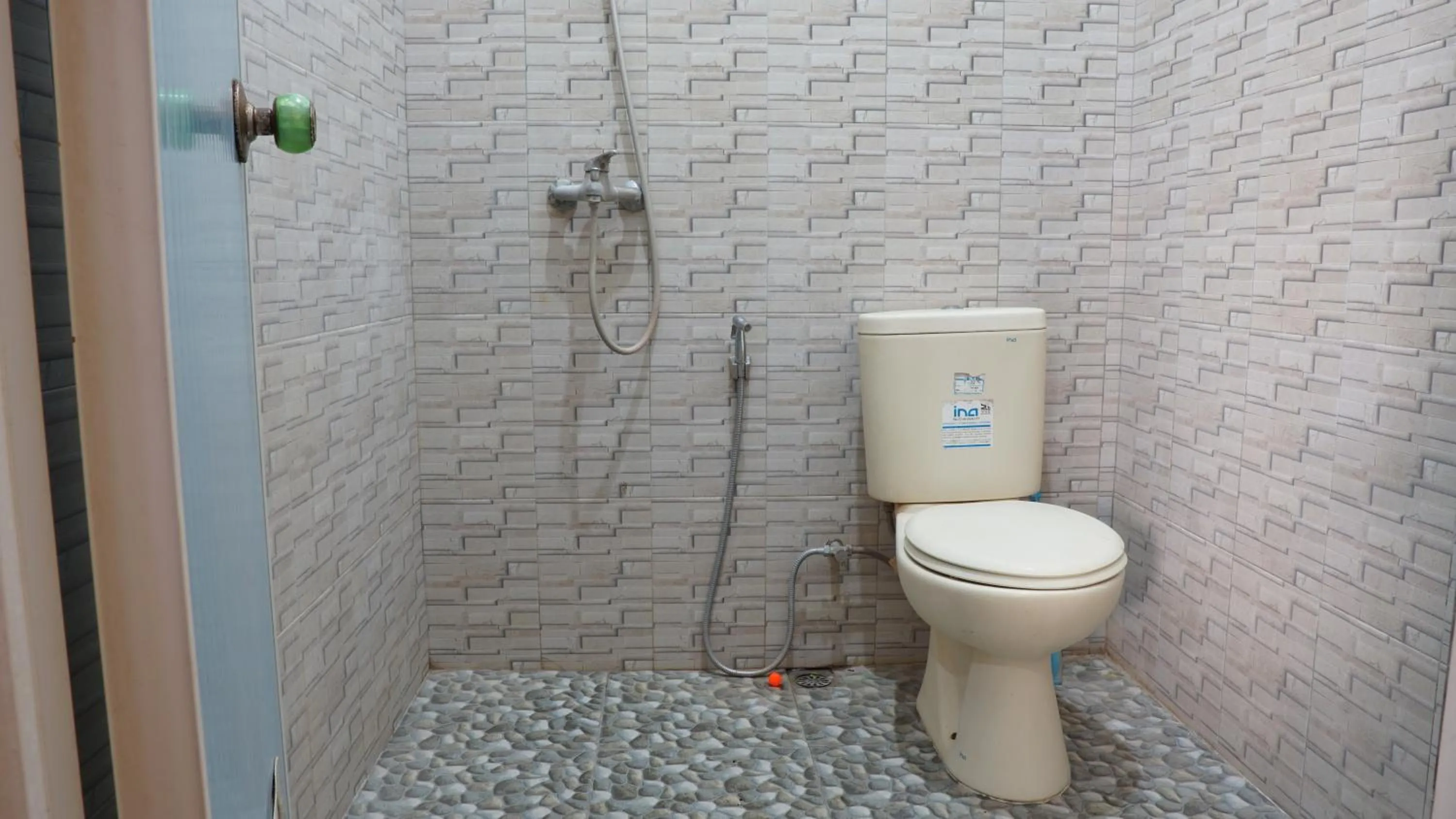 Bathroom in Hotel O Coconut Island Homestay & ResortNearPantai Pulau Merah