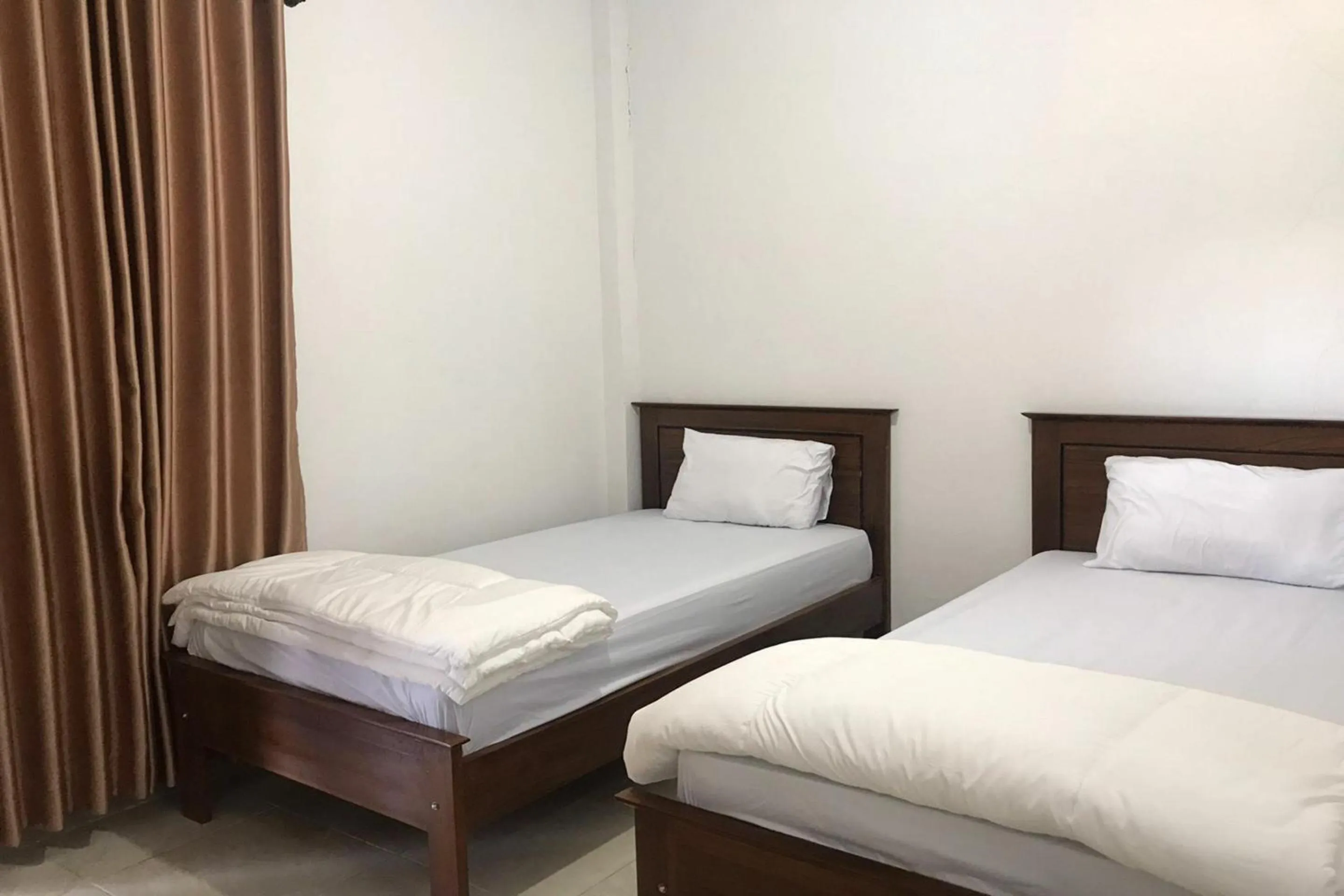 Bedroom, Bed in Hotel O Abc Homestay