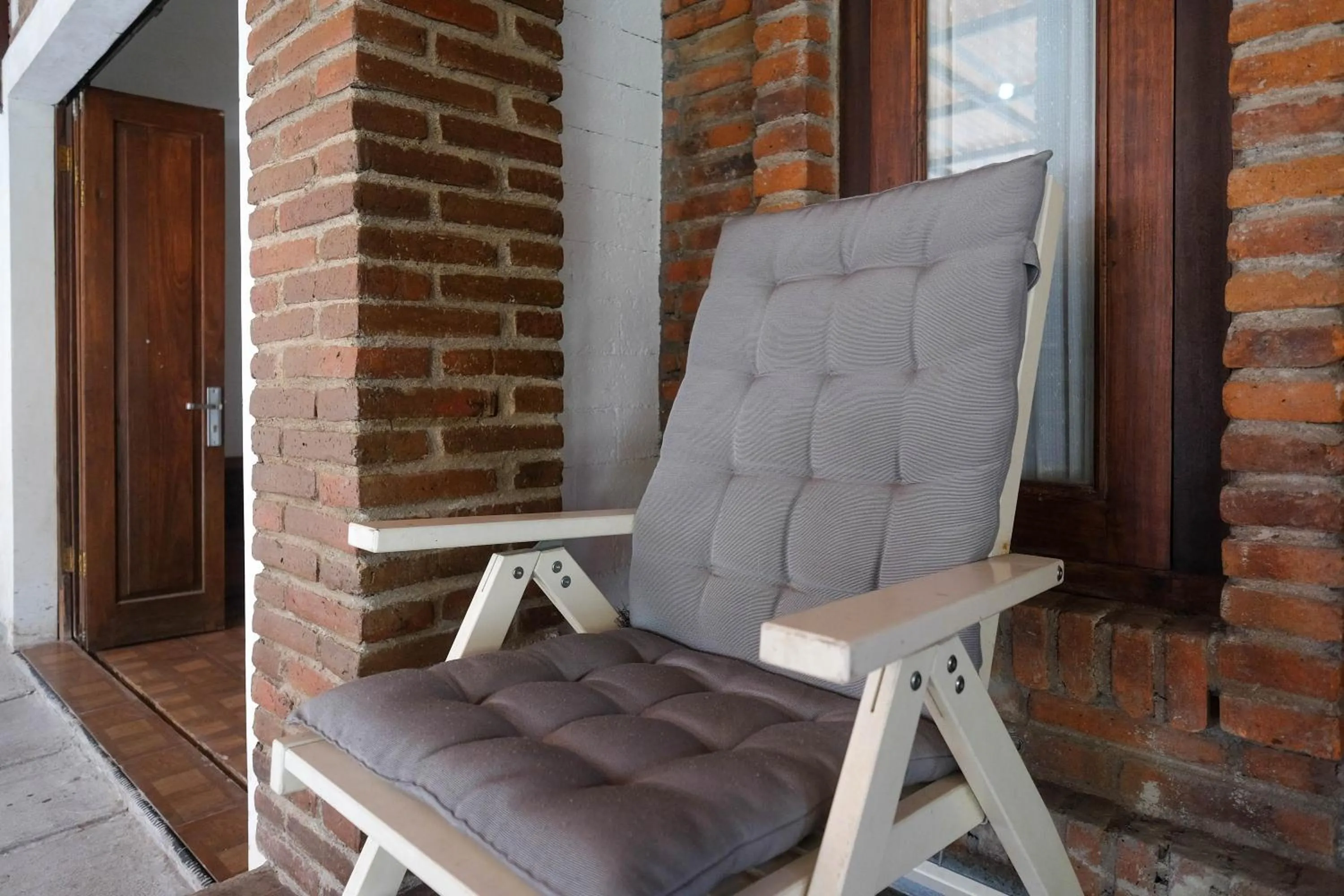 Seating area in RedDoorz Syariah near Stasiun Klaten