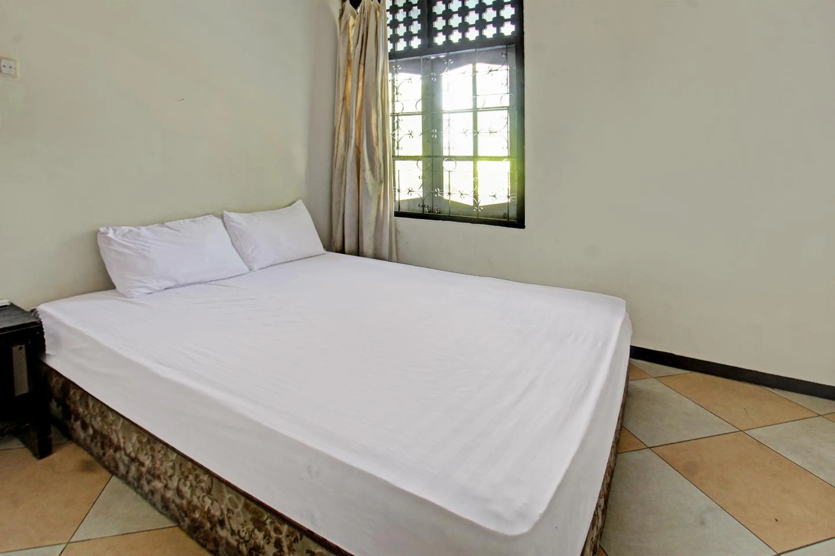 Bedroom, Bed in Hotel O Motel Langko