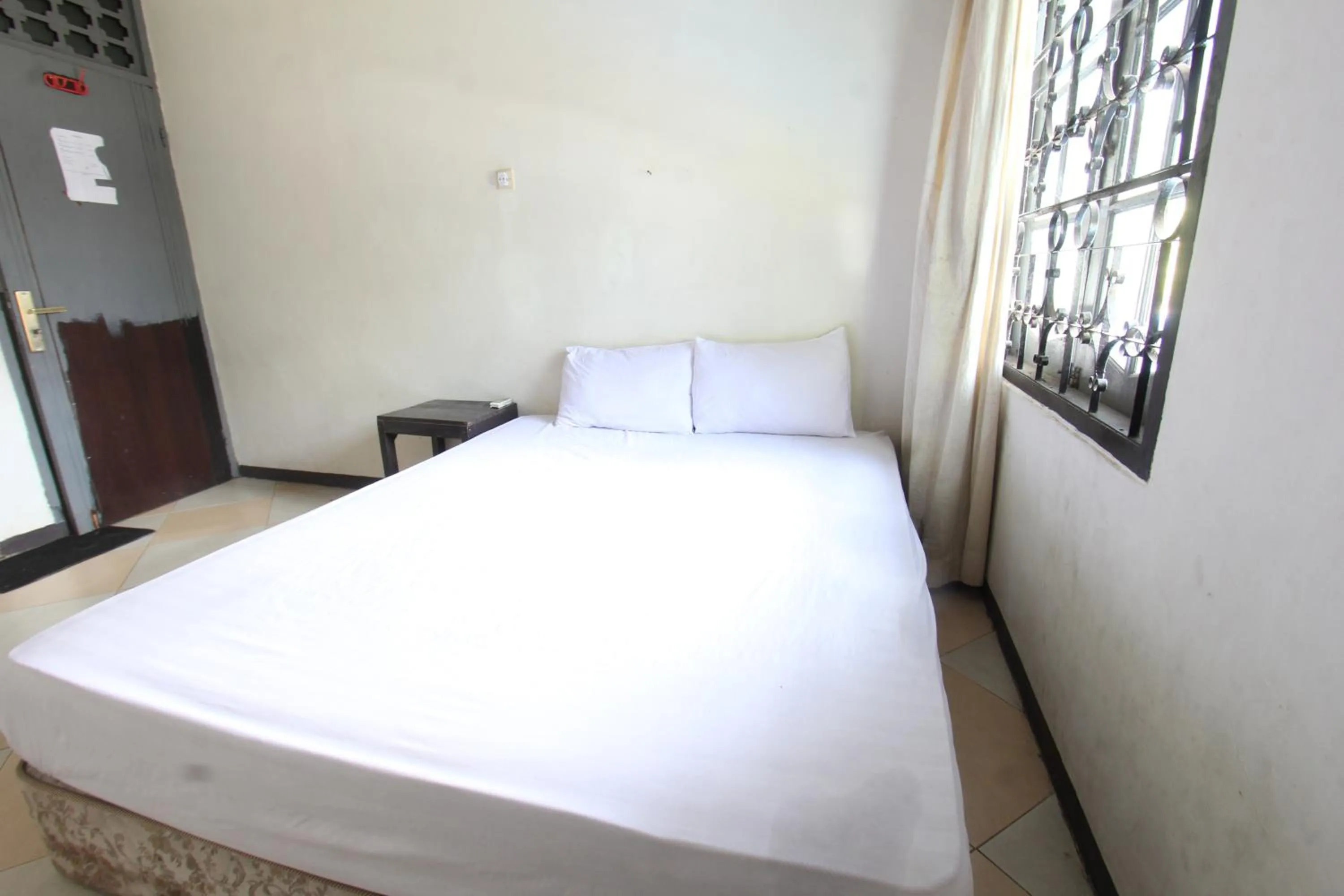 Bedroom, Bed in Hotel O Motel Langko