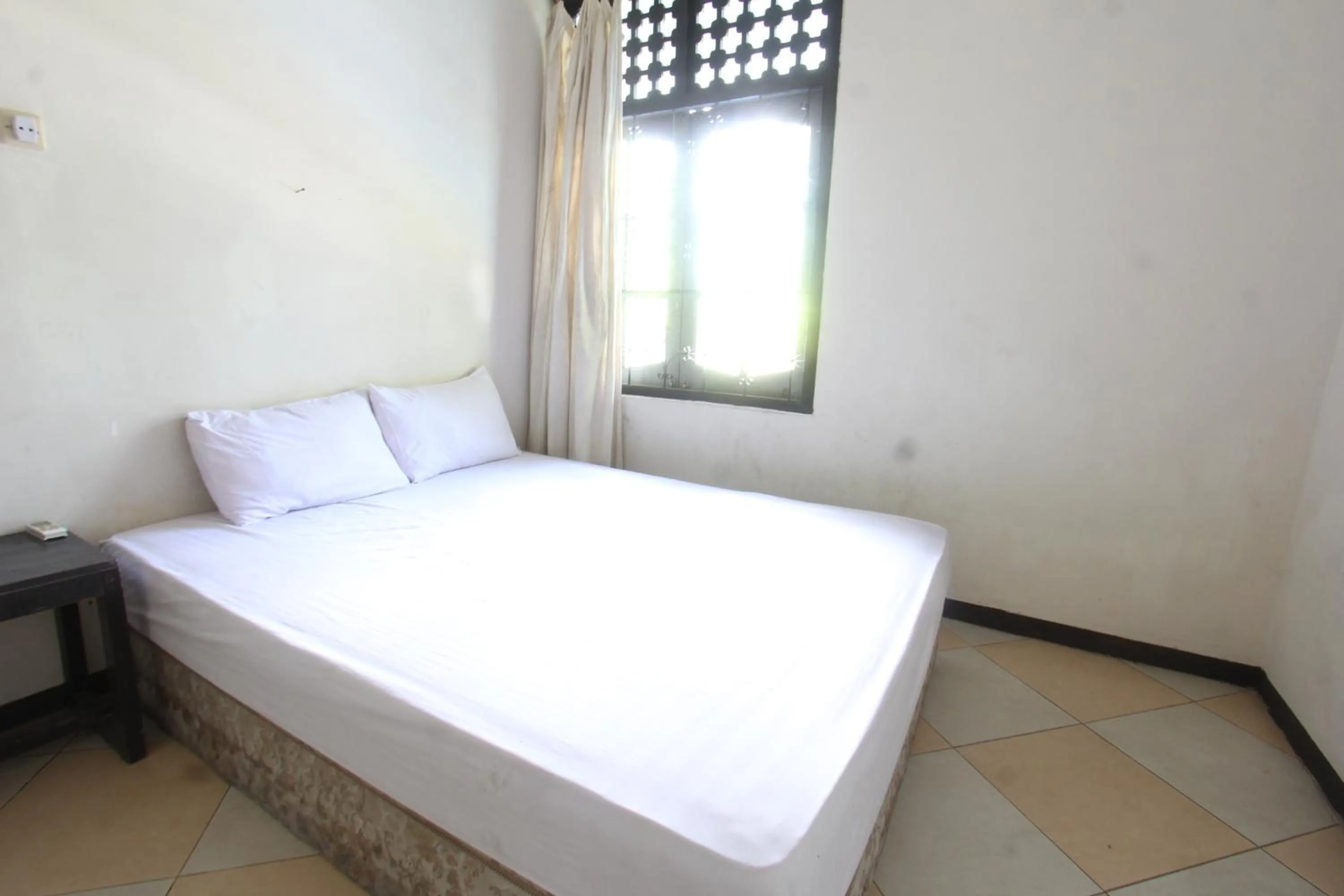 Bedroom, Bed in Hotel O Motel Langko