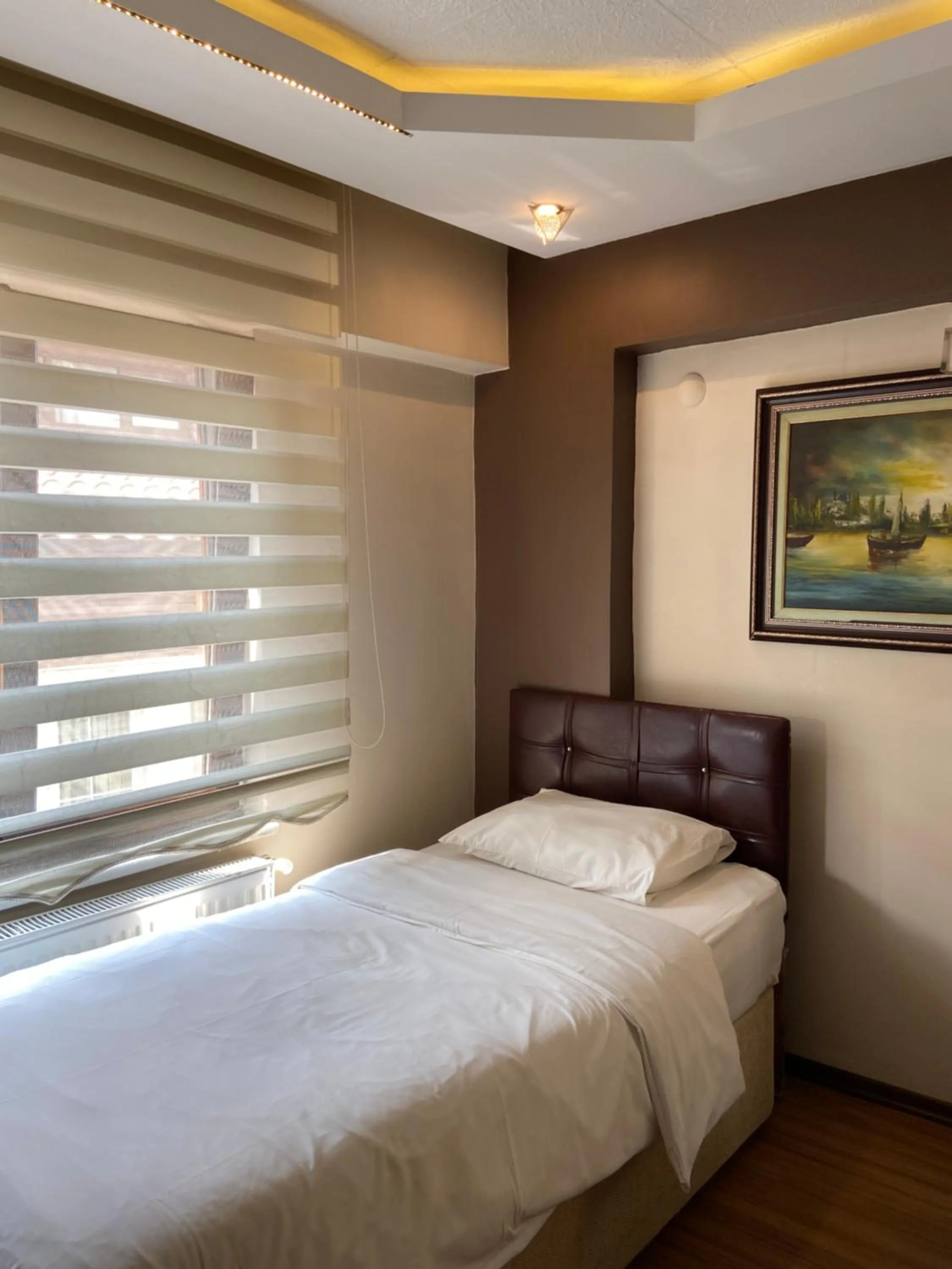 Communal lounge/ TV room, Bed in Araz Apart