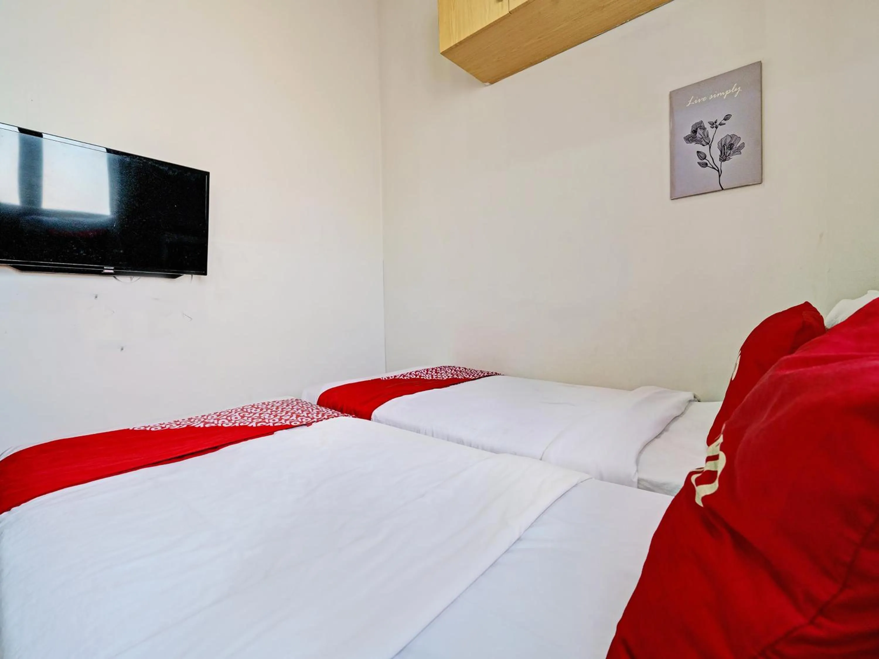 Bedroom in Hotel O Losmen Diah Syariah