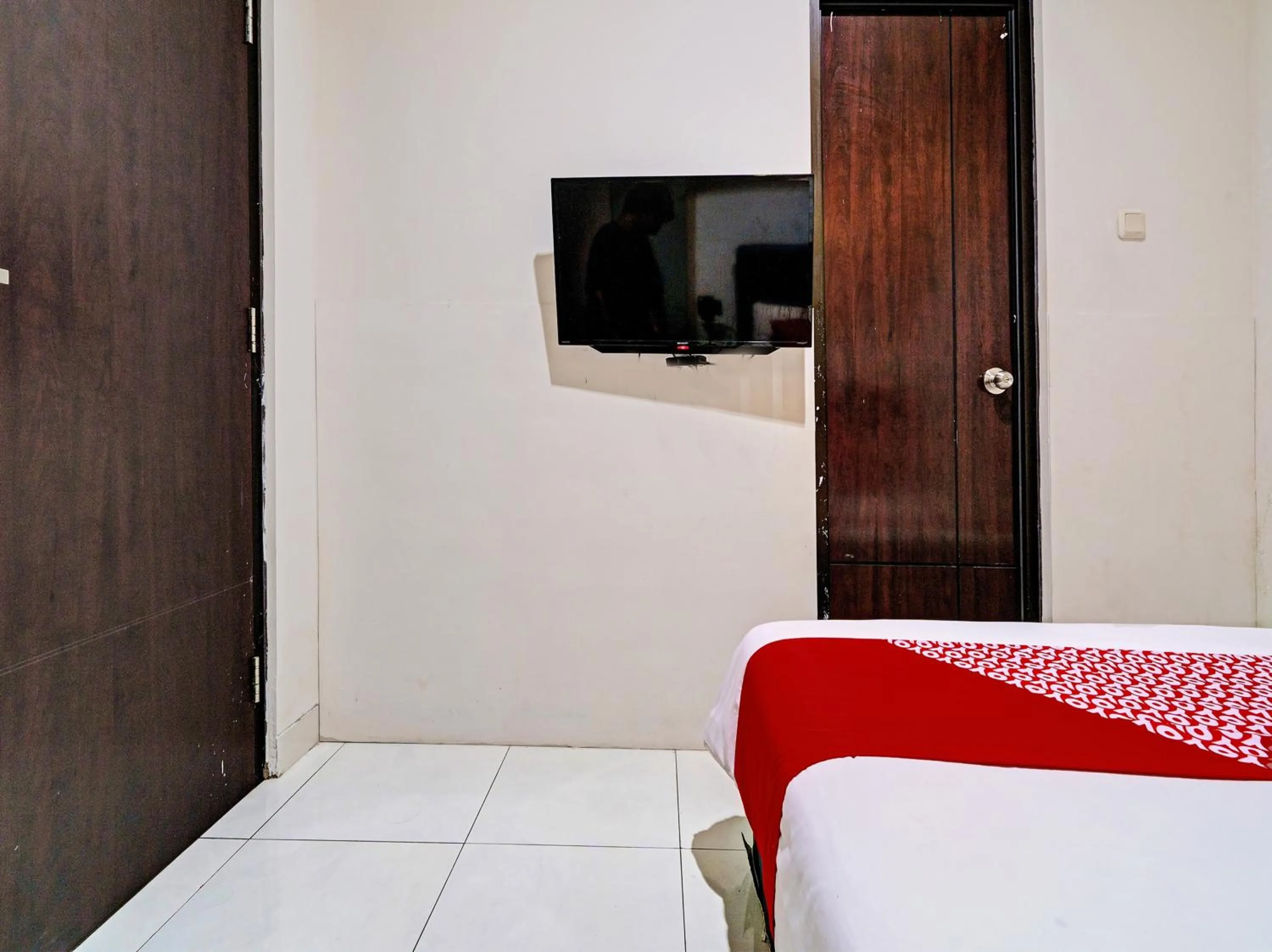 Bedroom in Hotel O Losmen Diah Syariah